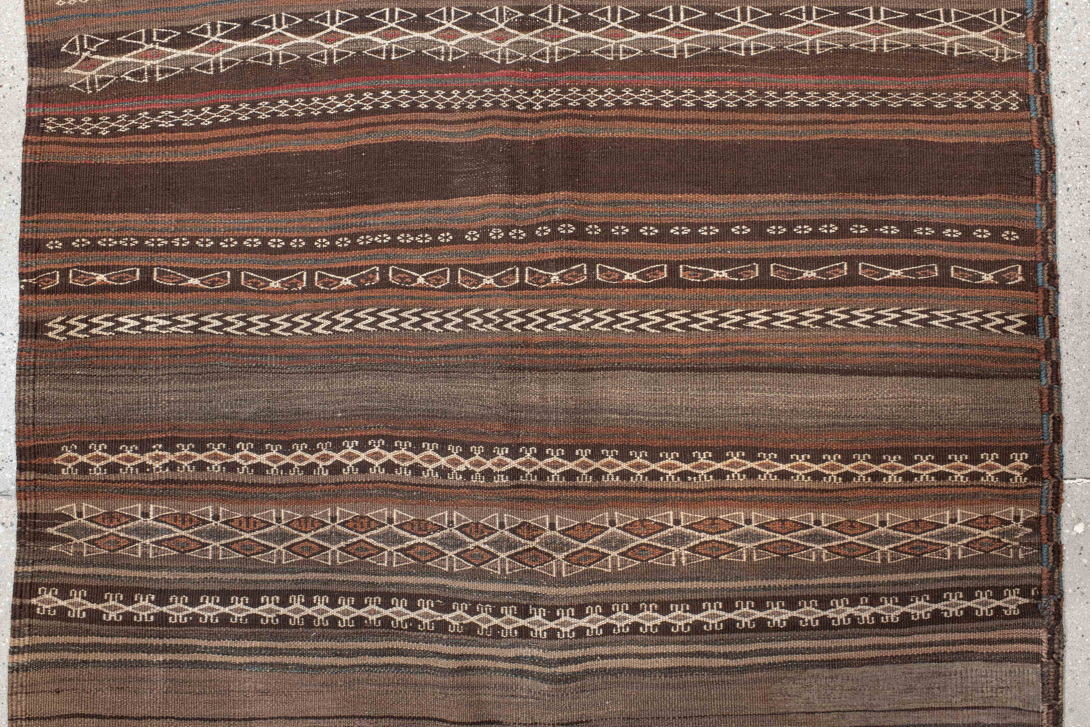 4' x 12' one-of-a-kind handmade antique Kilim runner rug. Color palette: brown, taupe, charcoal, ivory, camel, slate, beige