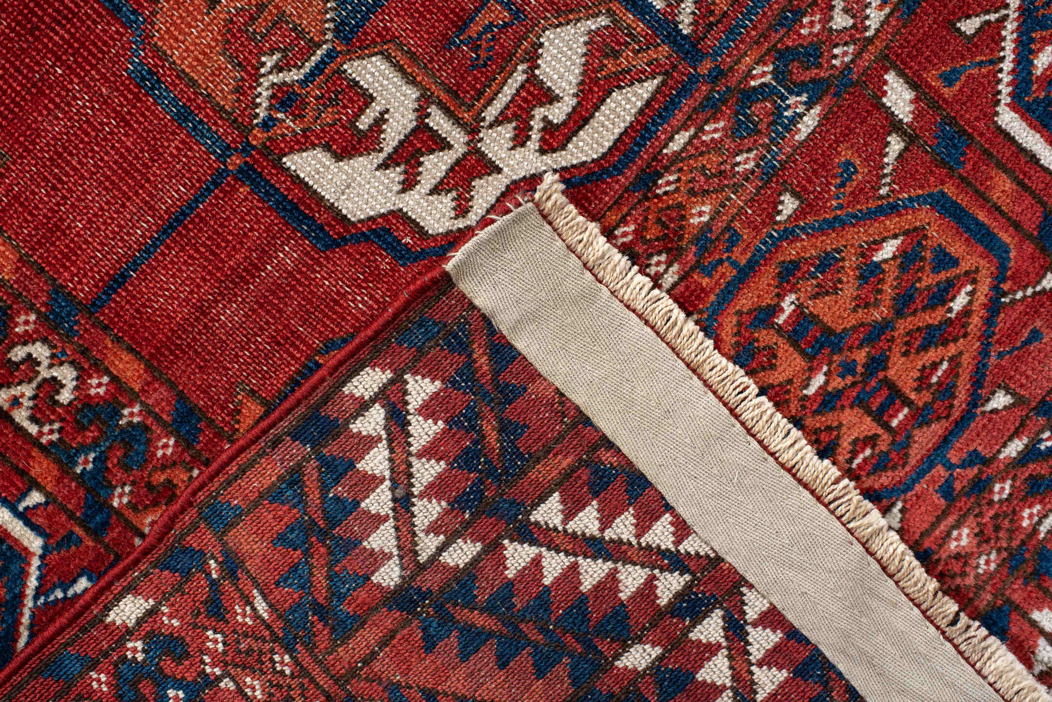 8' x 13' one-of-a-kind handmade vintage Bokara large size rug. Color palette: pink, red, brown, off-white, gray, blue