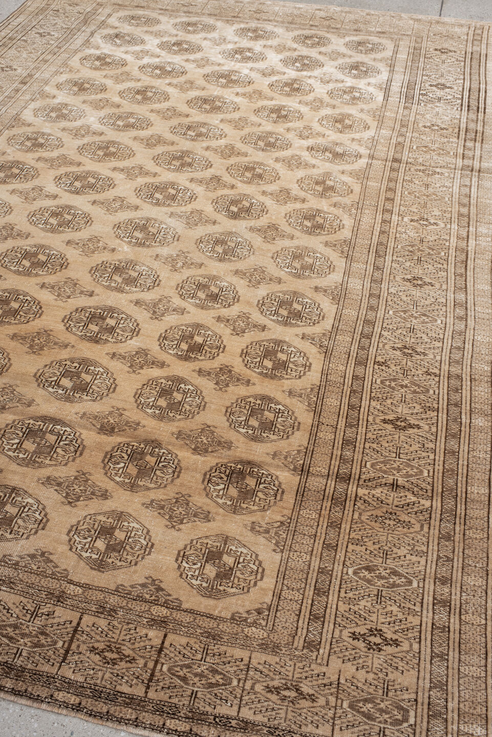 6' x 9' one-of-a-kind handmade antique Bokara medium size rug. Color palette: ivory, taupe, camel, beige, brown, gray