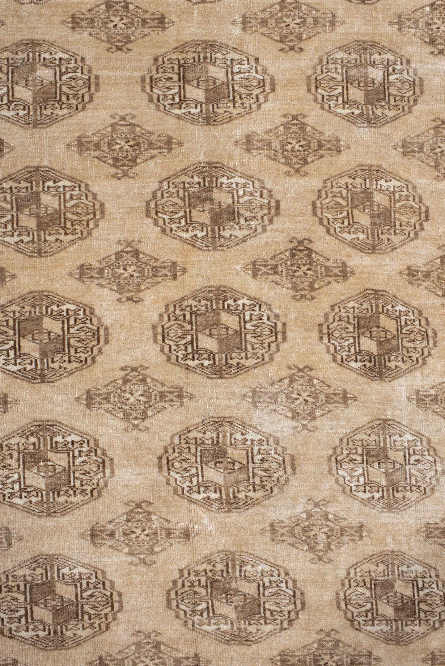 6' x 9' one-of-a-kind handmade antique Bokara medium size rug. Color palette: ivory, taupe, camel, beige, brown, gray