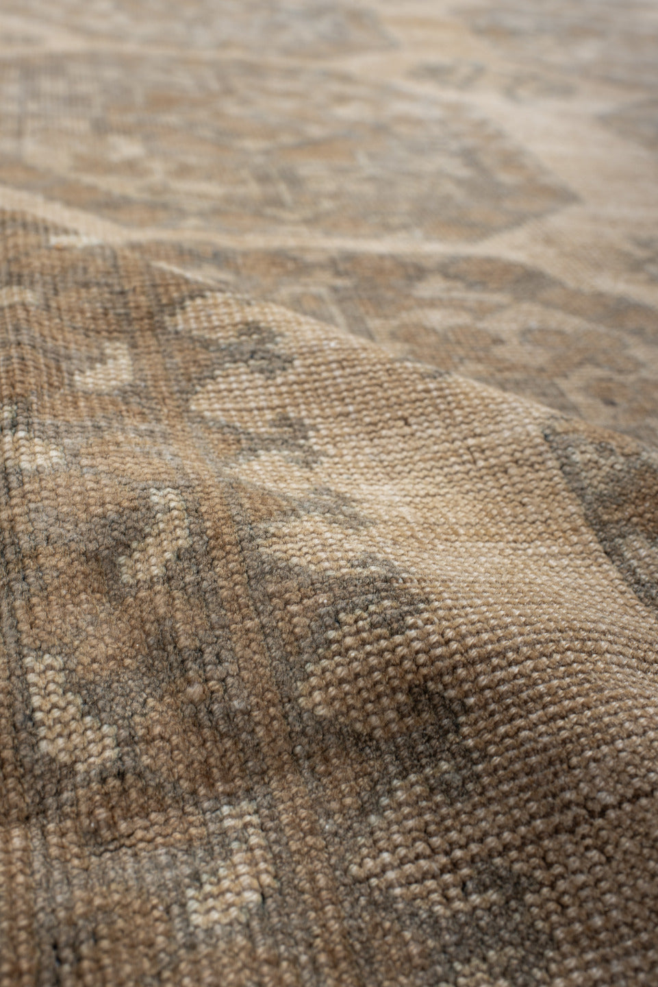 6' x 9' one-of-a-kind handmade antique Afghan rug. Color palette: ivory, taupe, beige, camel, sage, brown, gray, green