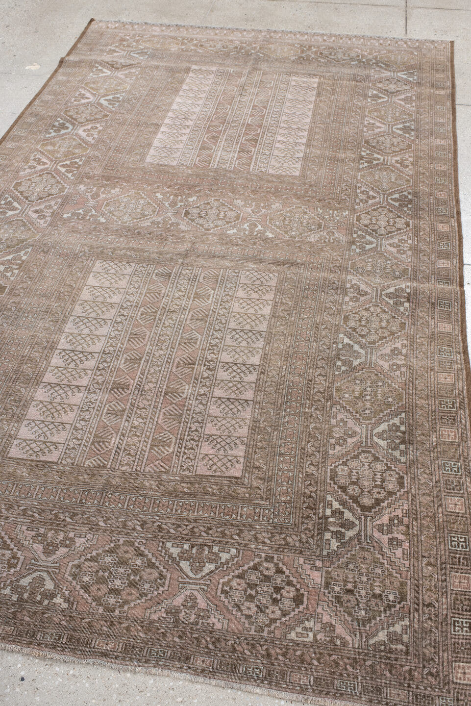 5' x 9' one-of-a-kind handmade antique Afghan medium size rug. Color palette: taupe, ivory, camel, brown, rose, beige, gray