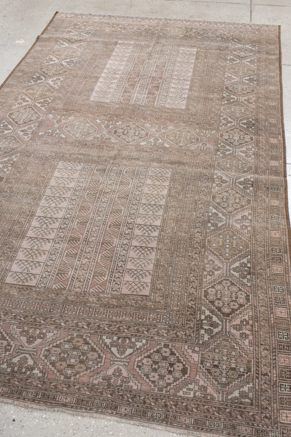 5' x 9' one-of-a-kind handmade antique Afghan medium size rug. Color palette: taupe, ivory, camel, brown, rose, beige, gray
