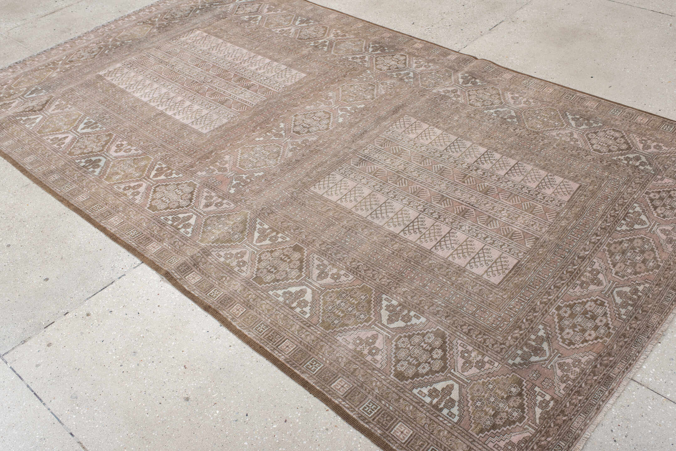 5' x 9' one-of-a-kind handmade antique Afghan medium size rug. Color palette: taupe, ivory, camel, brown, rose, beige, gray