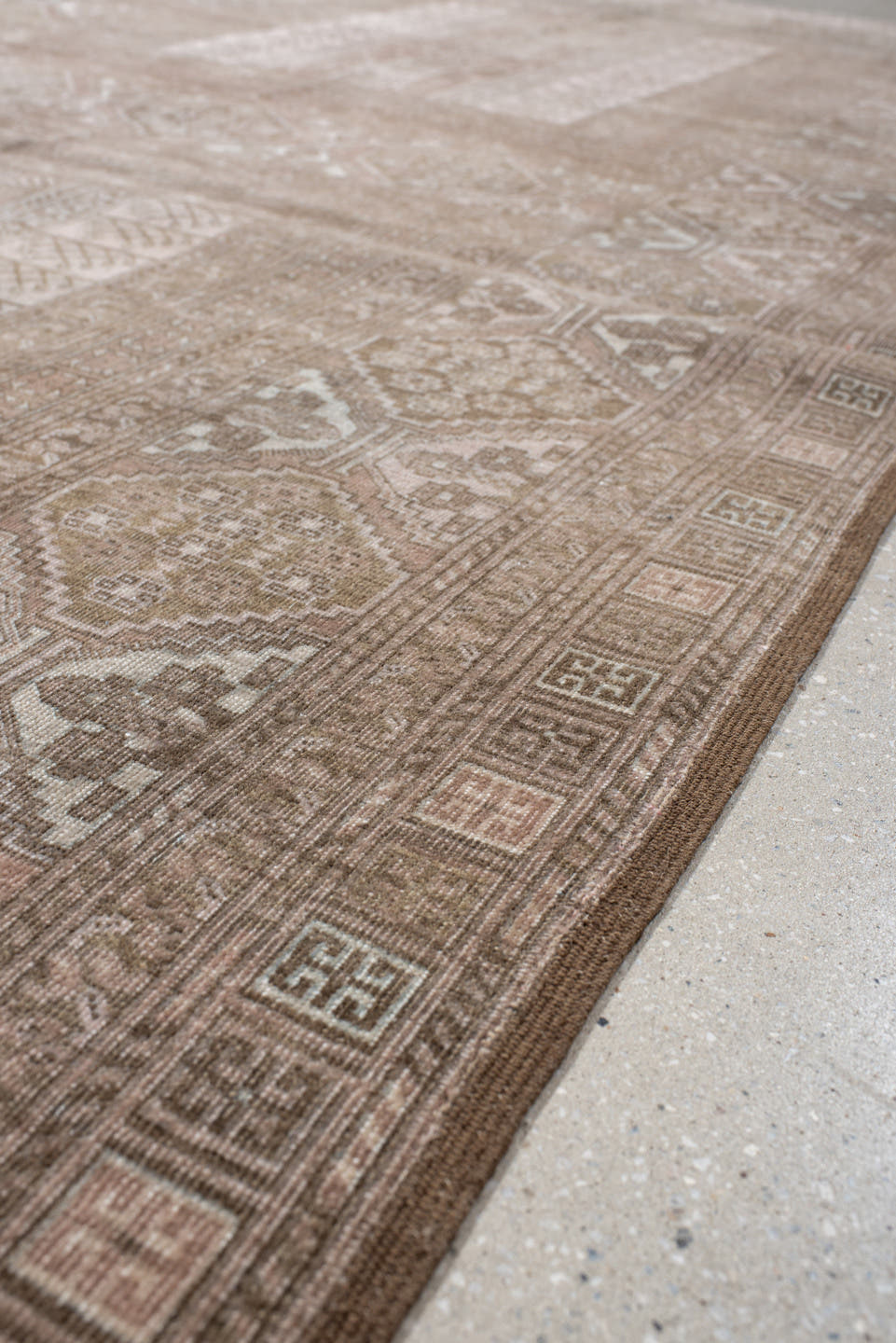 5' x 9' one-of-a-kind handmade antique Afghan medium size rug. Color palette: taupe, ivory, camel, brown, rose, beige, gray