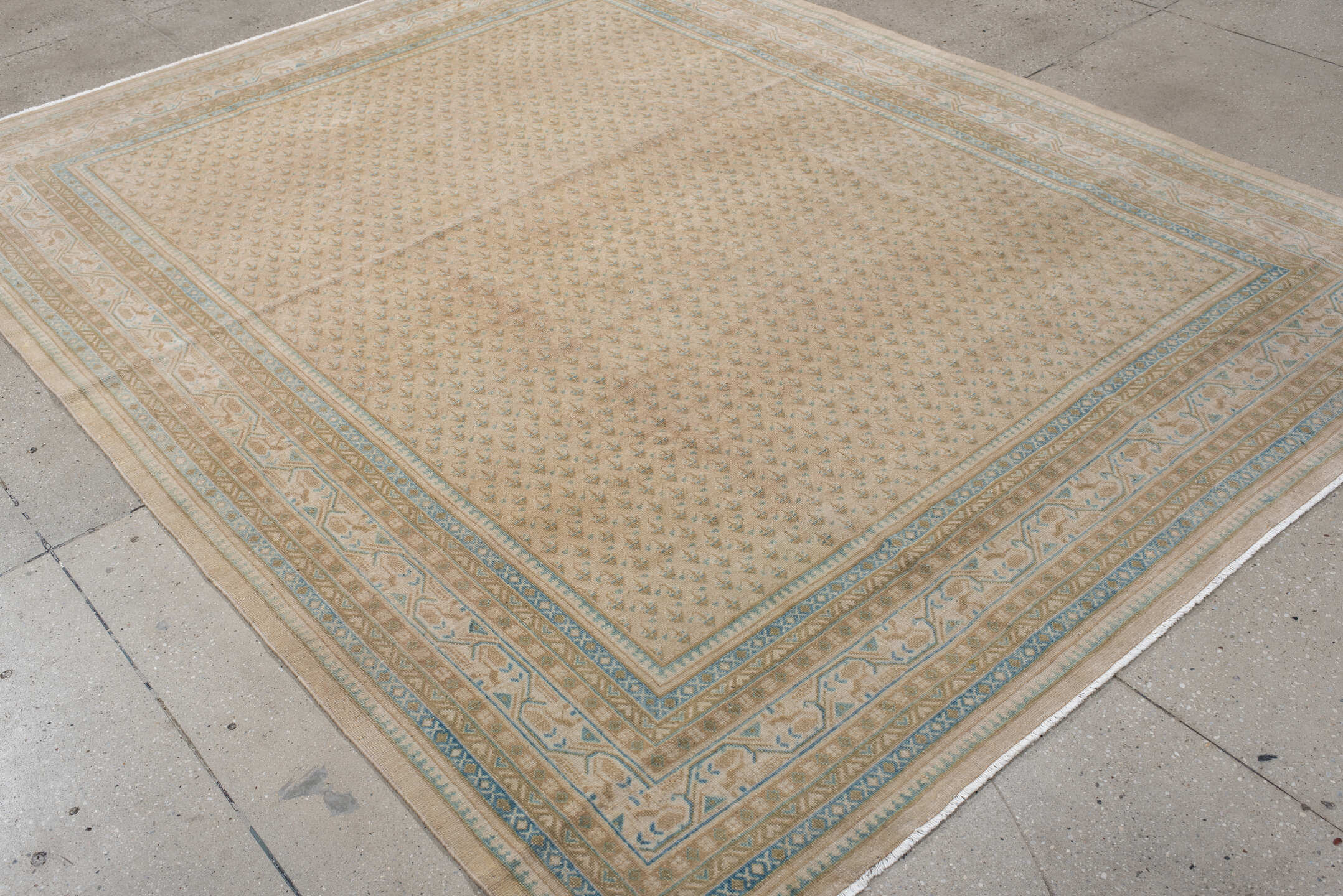 7' x 9' one-of-a-kind handmade antique Mir rug. Color palette: ivory, pale blue, beige, taupe, camel, light blue, gray
