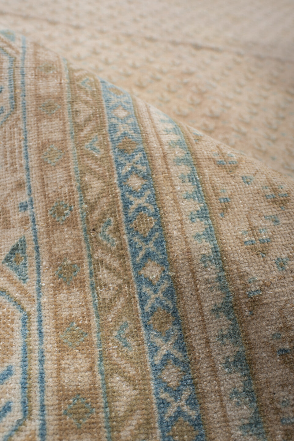 7' x 9' one-of-a-kind handmade antique Mir rug. Color palette: ivory, pale blue, beige, taupe, camel, light blue, gray