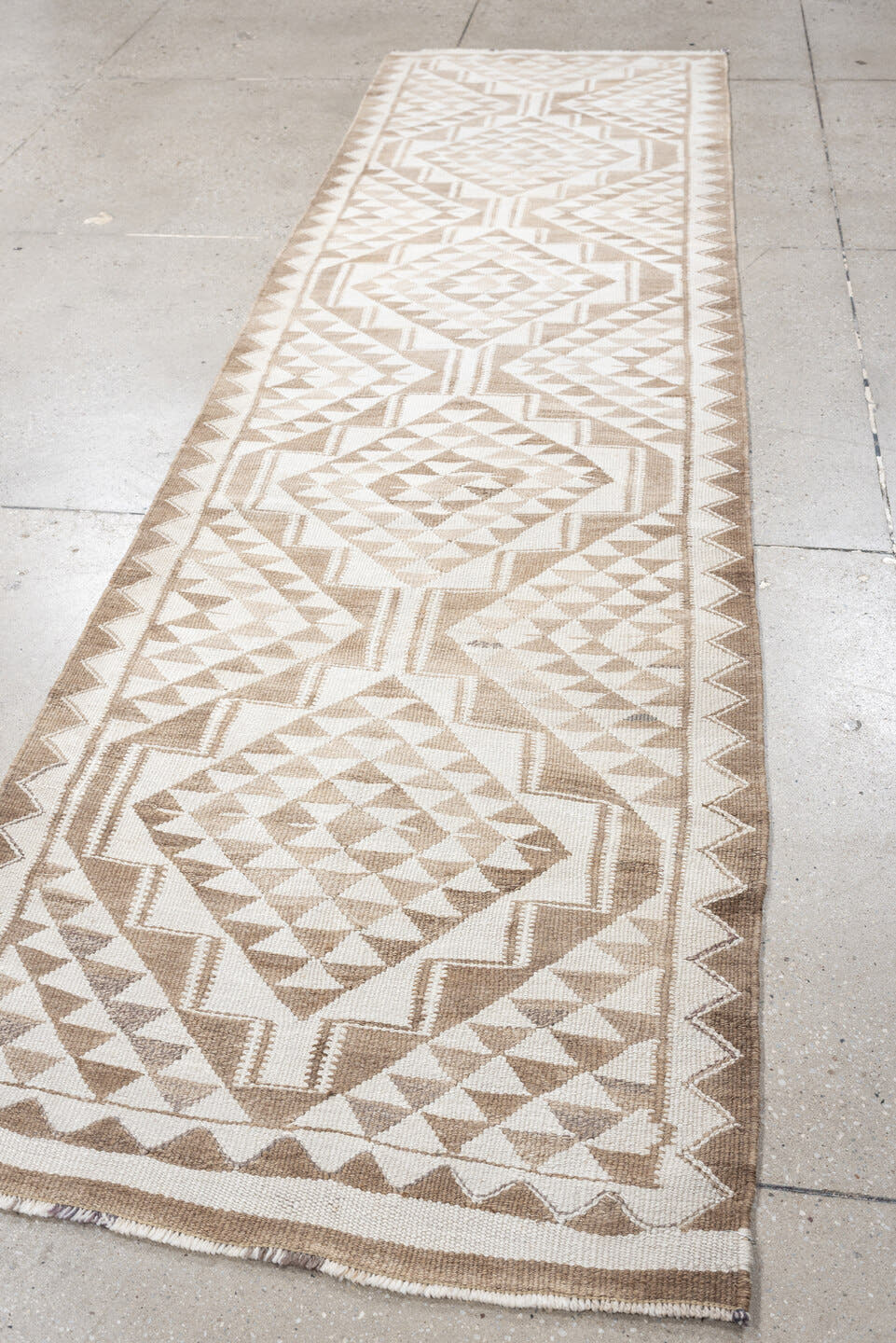 2' x 10' one-of-a-kind handmade antique Kilim runner rug. Color palette: ivory, taupe, beige, sand, gray