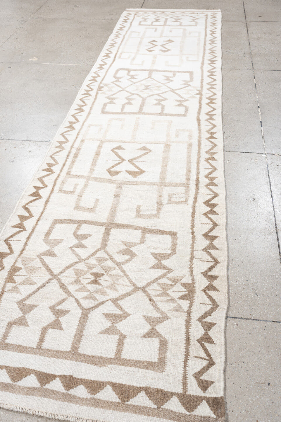 2' x 11' one-of-a-kind handmade antique Kilim runner rug. Color palette: ivory, taupe, beige, sand, gray