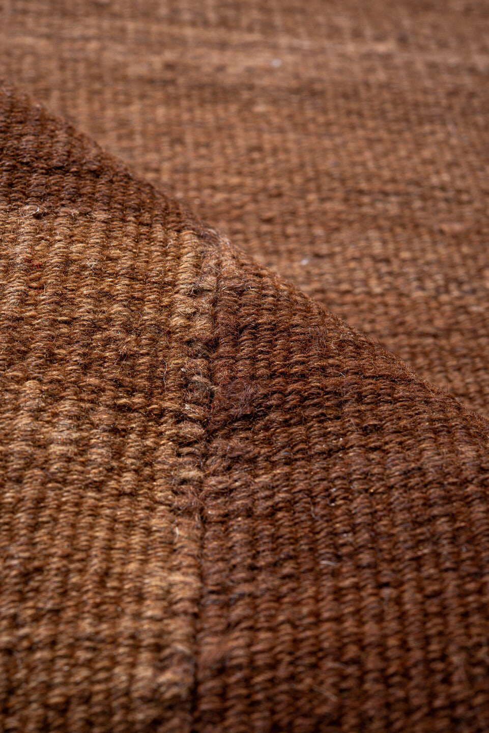 7' x 9' one-of-a-kind handmade vintage Kilim rug. Color palette: brown, pink, redwood