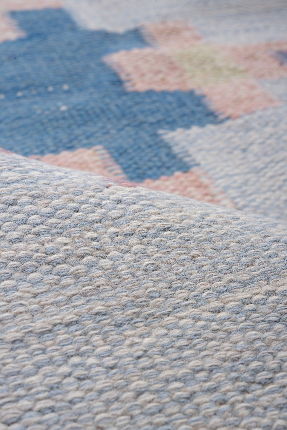 6' x 9' one-of-a-kind handmade vintage Rollaken medium size rug. Color palette: sky blue, ivory, pale blue, blush, cream