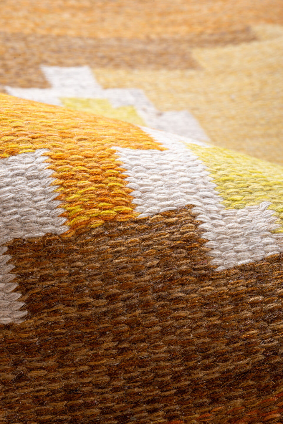 6' x 9' one-of-a-kind handmade antique Rollaken medium size rug. Color palette: camel, ochre, ivory, taupe, saffron, brown