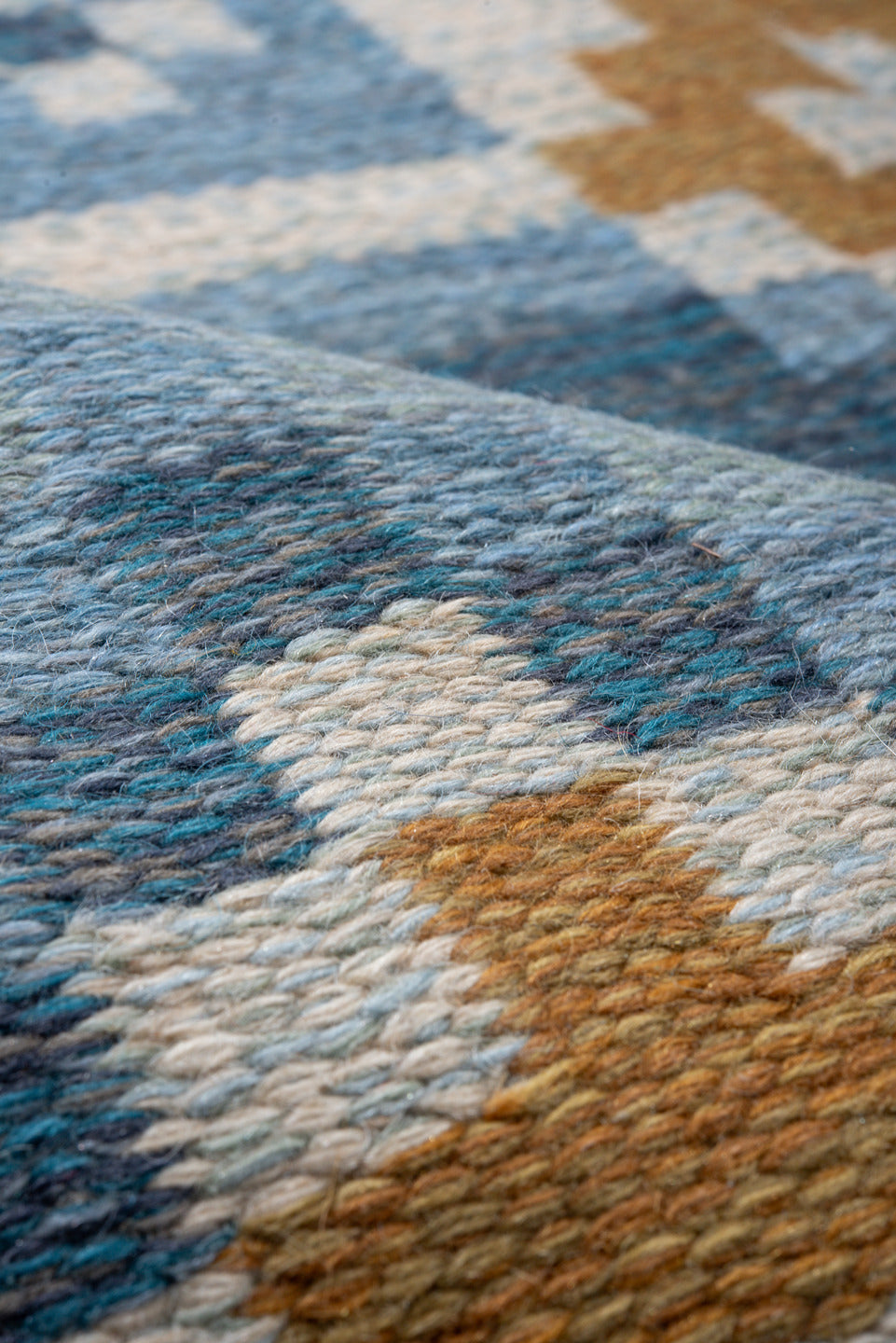 5' x 8' one-of-a-kind handmade vintage Rollaken medium size rug. Color palette: blue, brown, dark gray, fiord, gainsboro