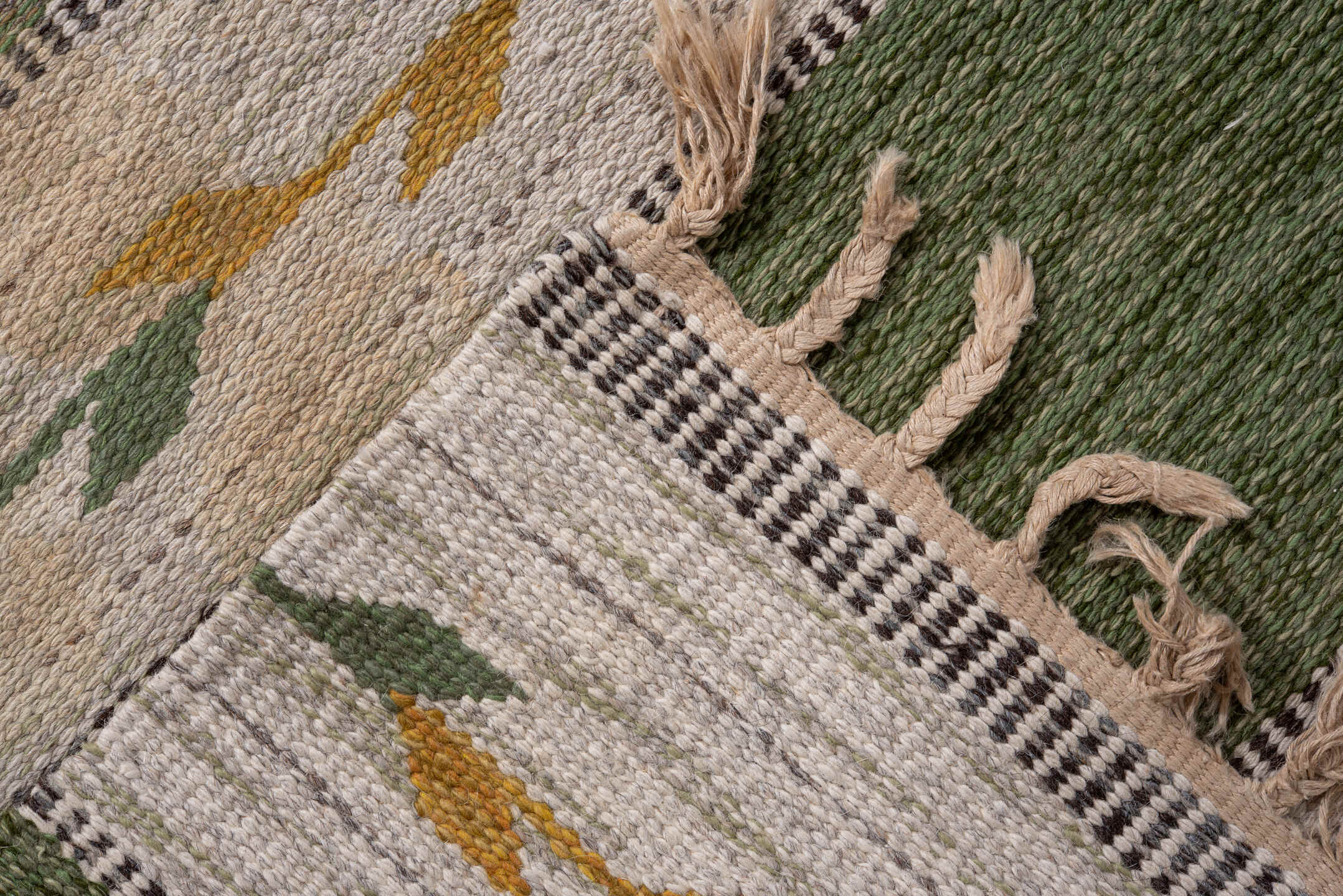 5' x 7' one-of-a-kind handmade antique Rollaken rug. Color palette: olive, ivory, sage, taupe, gold, gray, green, beige