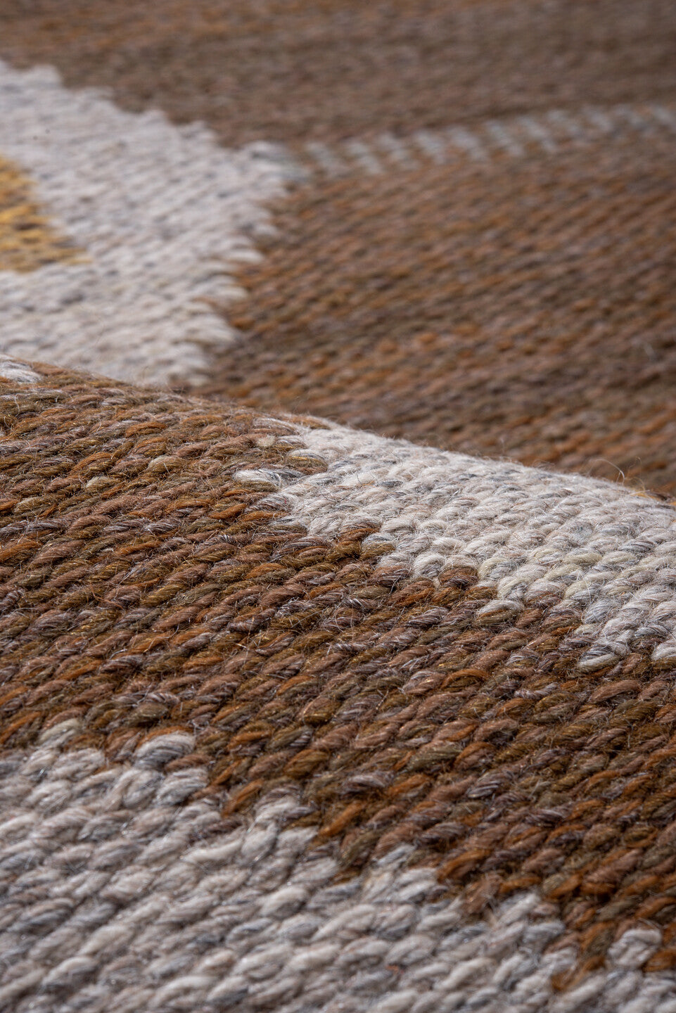 5' x 7' one-of-a-kind handmade antique Rollaken rug. Color palette: brown, ivory, gray, taupe, gold, beige