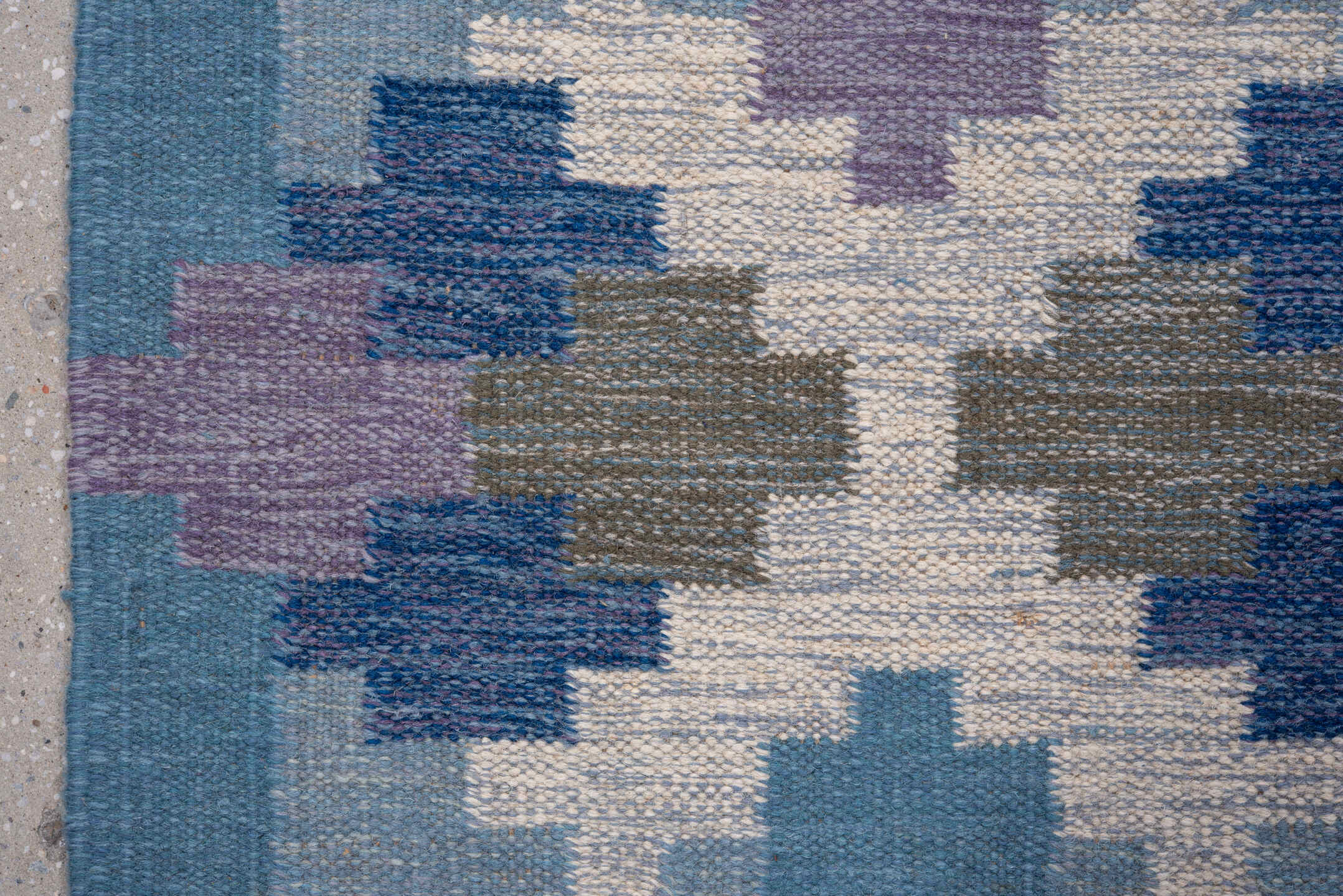 5' x 7' one-of-a-kind handmade antique Rollaken rug. Color palette: sky blue, cornflower blue, navy, ivory, lavender, slate