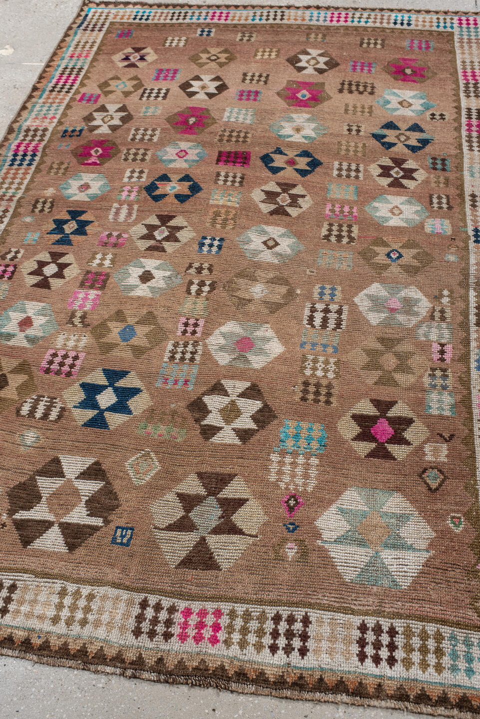 4' x 7' one-of-a-kind handmade vintage Gabbe rug. Color palette: camel, ivory, brown, turquoise, magenta, taupe, navy, rose
