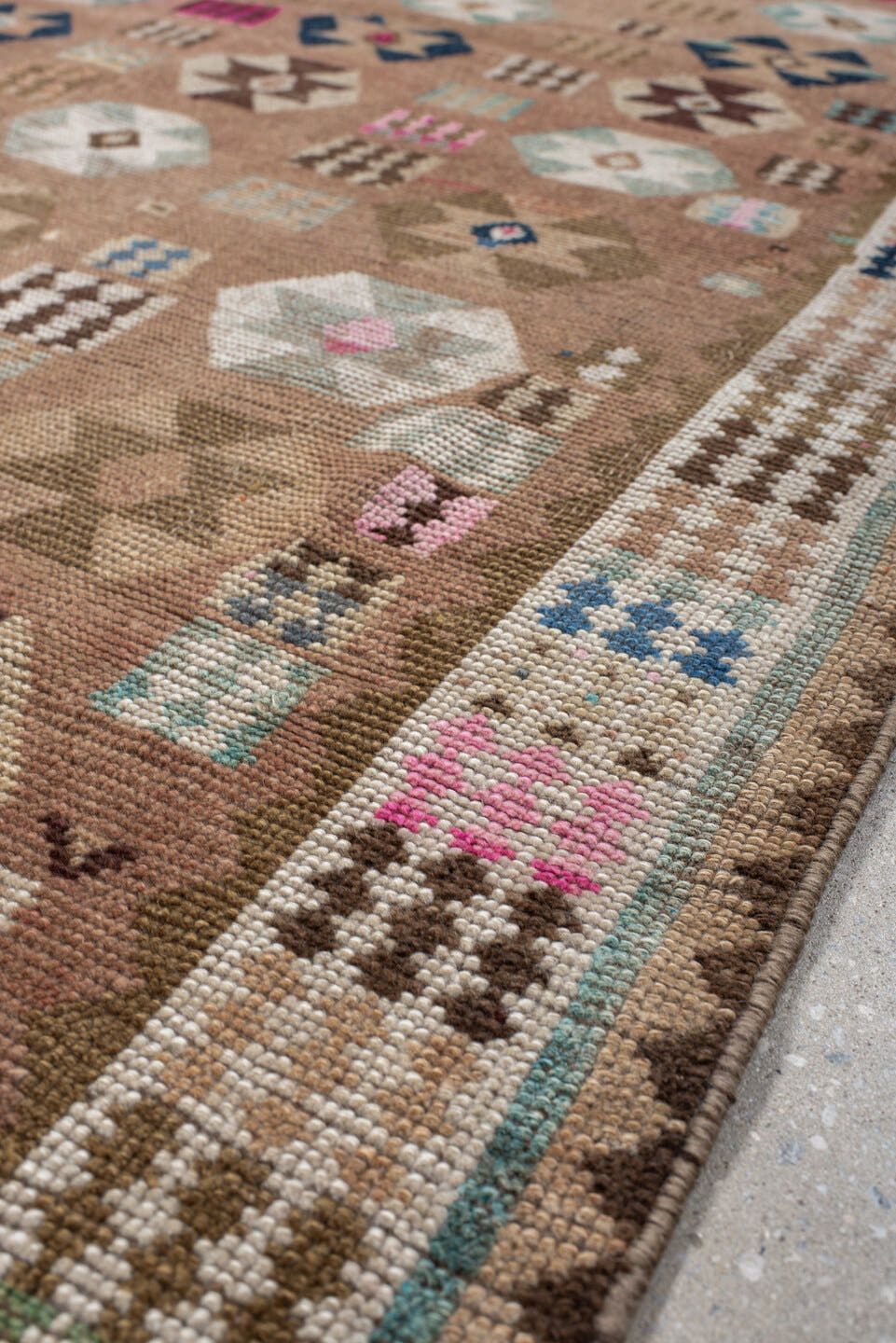 4' x 7' one-of-a-kind handmade vintage Gabbe rug. Color palette: camel, ivory, brown, turquoise, magenta, taupe, navy, rose