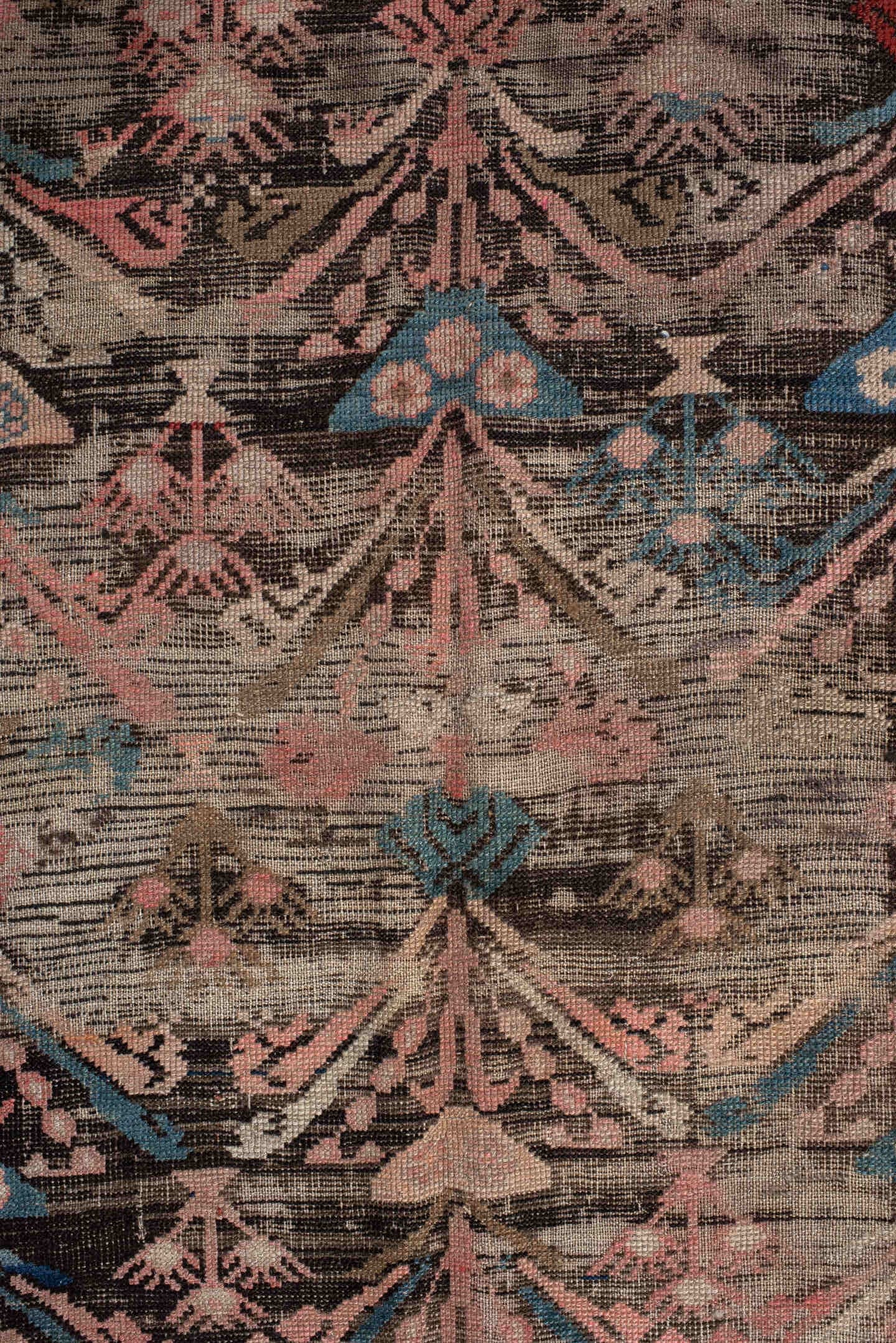 4' x 8' one-of-a-kind handmade vintage Karabagh rug. Color palette: charcoal, rust, ivory, turquoise, rose, taupe, navy
