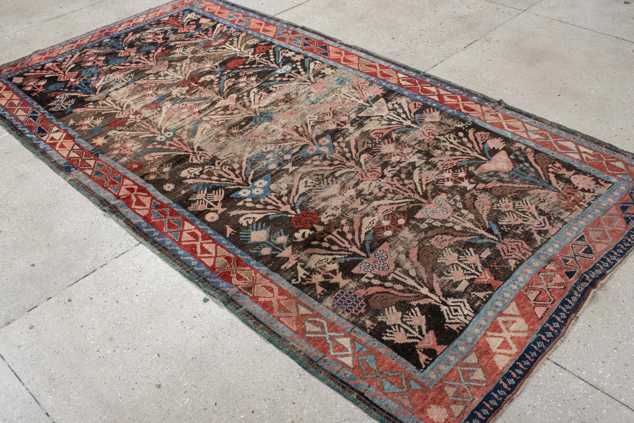 4' x 8' one-of-a-kind handmade vintage Karabagh rug. Color palette: charcoal, rust, ivory, turquoise, rose, taupe, navy