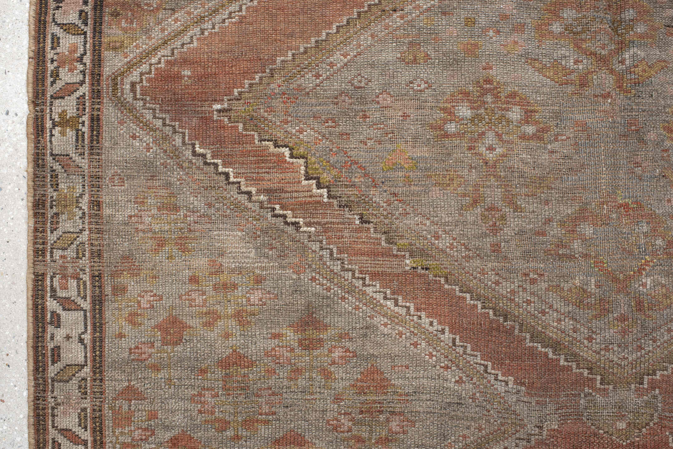 5' x 11' one-of-a-kind handmade antique NW Persian rug. Color palette: taupe, terra cotta, ivory, brown, sage, rust, beige