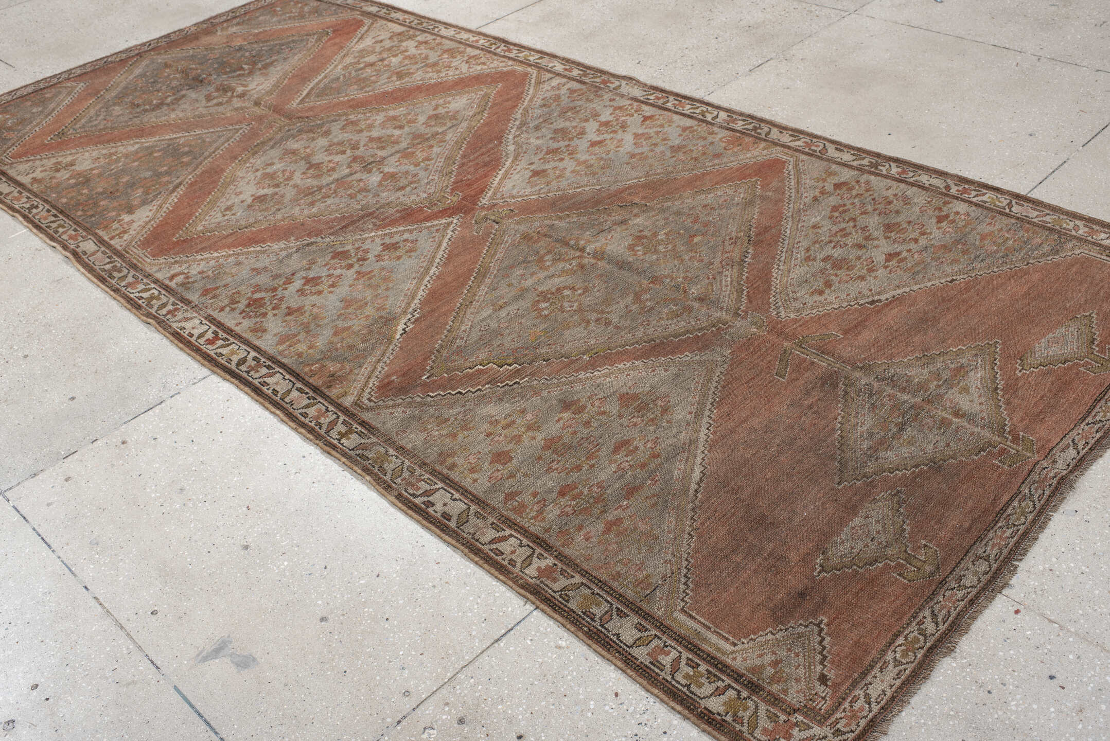 5' x 11' one-of-a-kind handmade antique NW Persian rug. Color palette: taupe, terra cotta, ivory, brown, sage, rust, beige