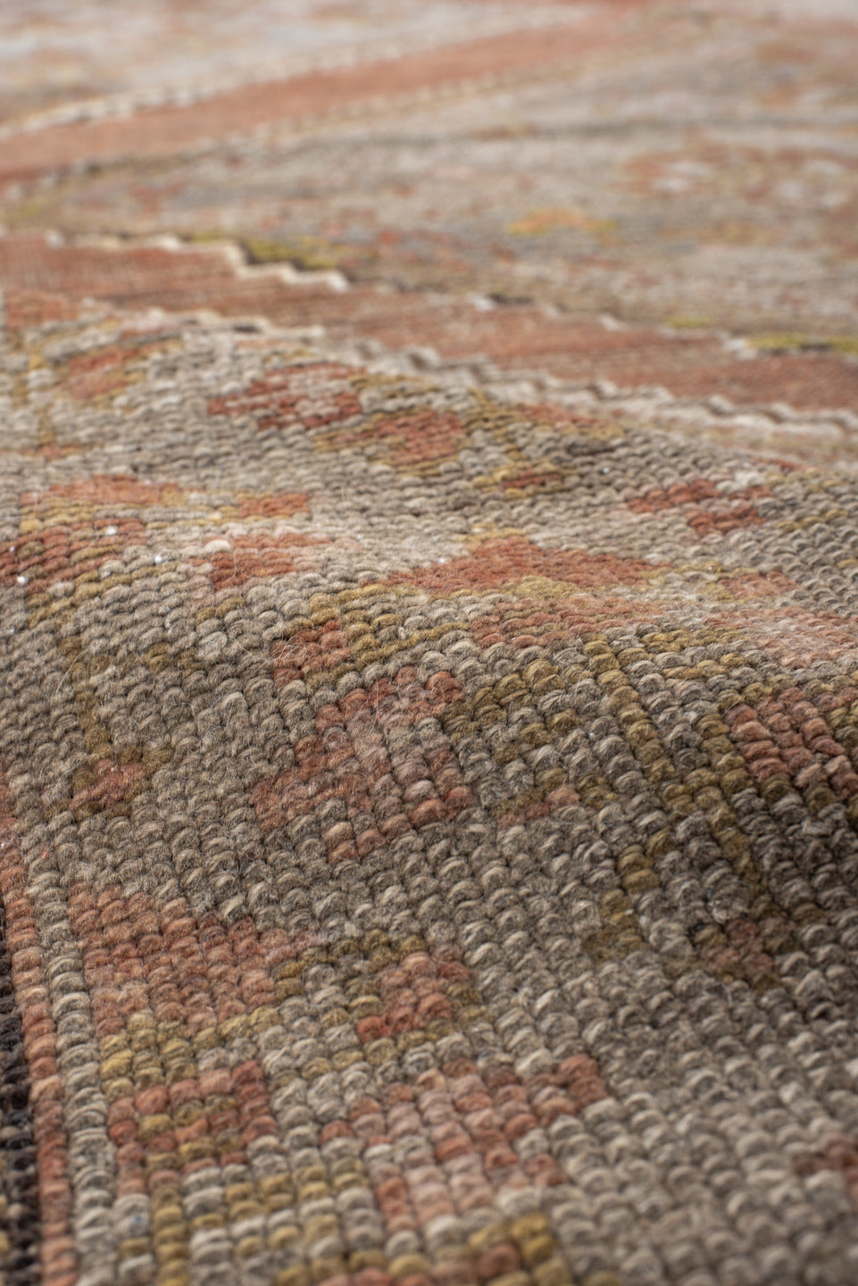 5' x 11' one-of-a-kind handmade antique NW Persian rug. Color palette: taupe, terra cotta, ivory, brown, sage, rust, beige