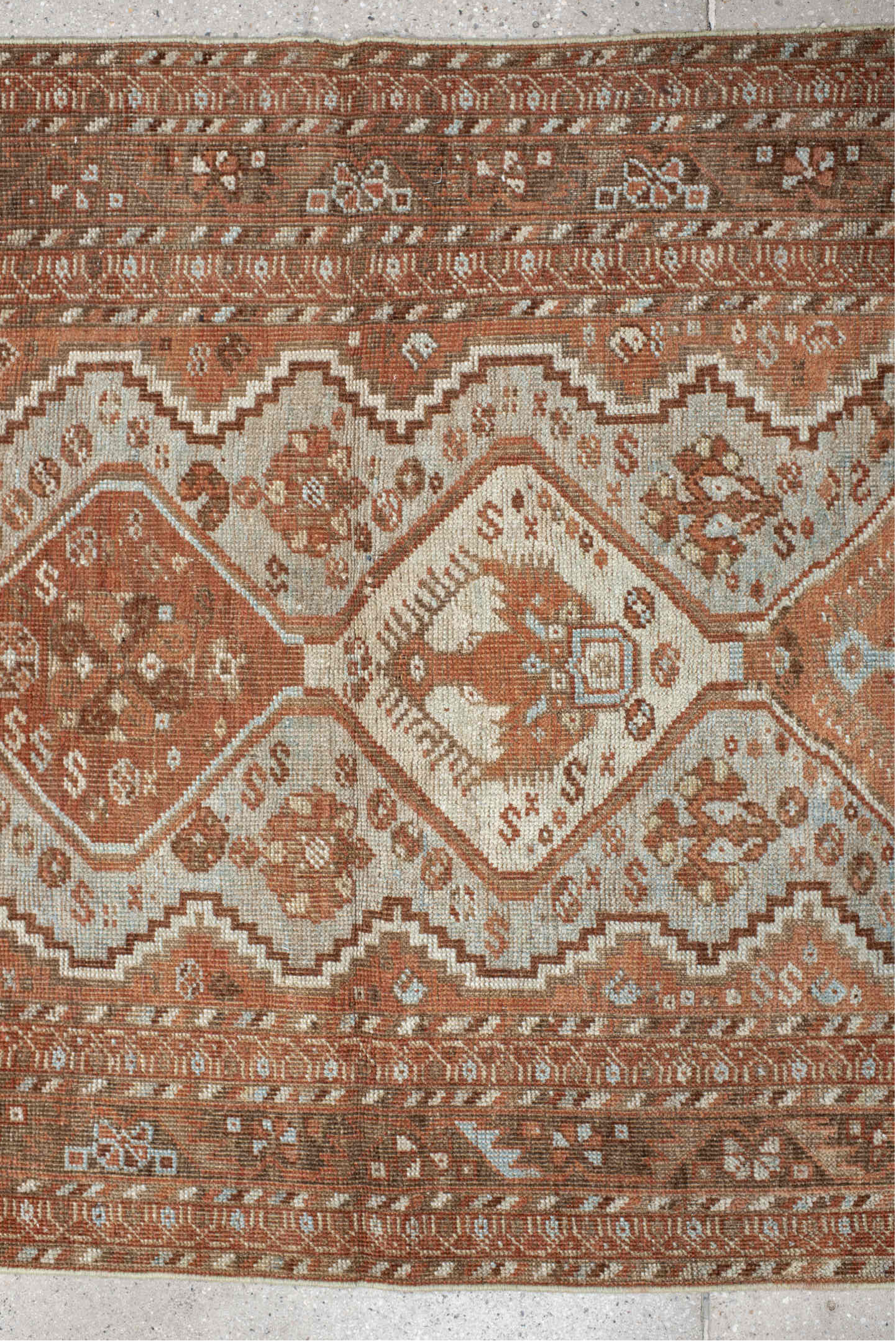 3' x 12' one-of-a-kind handmade vintage Shiraz runner rug. Color palette: ivory, rust, camel, taupe, pale blue, brown