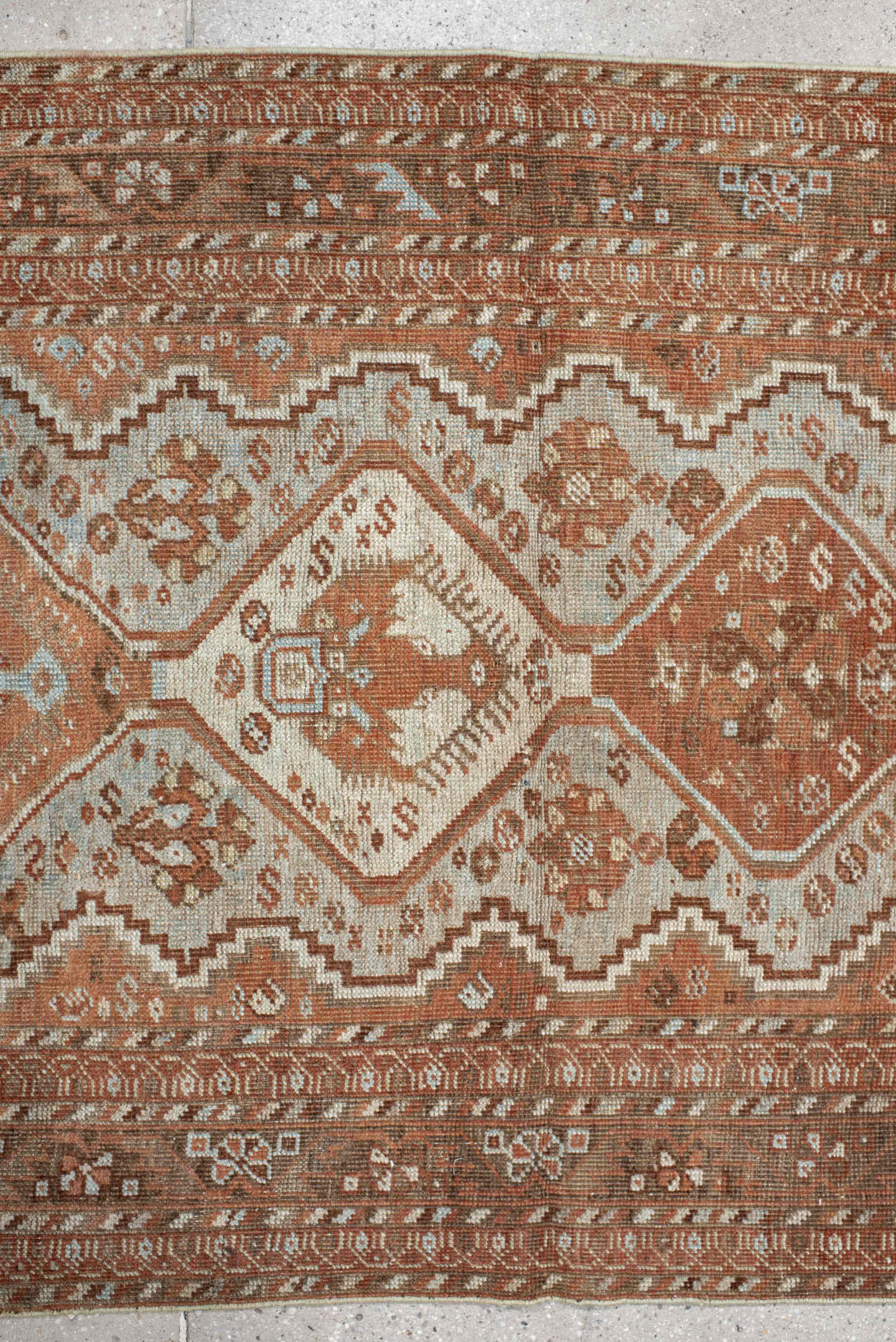 3' x 12' one-of-a-kind handmade vintage Shiraz runner rug. Color palette: ivory, rust, camel, taupe, pale blue, brown