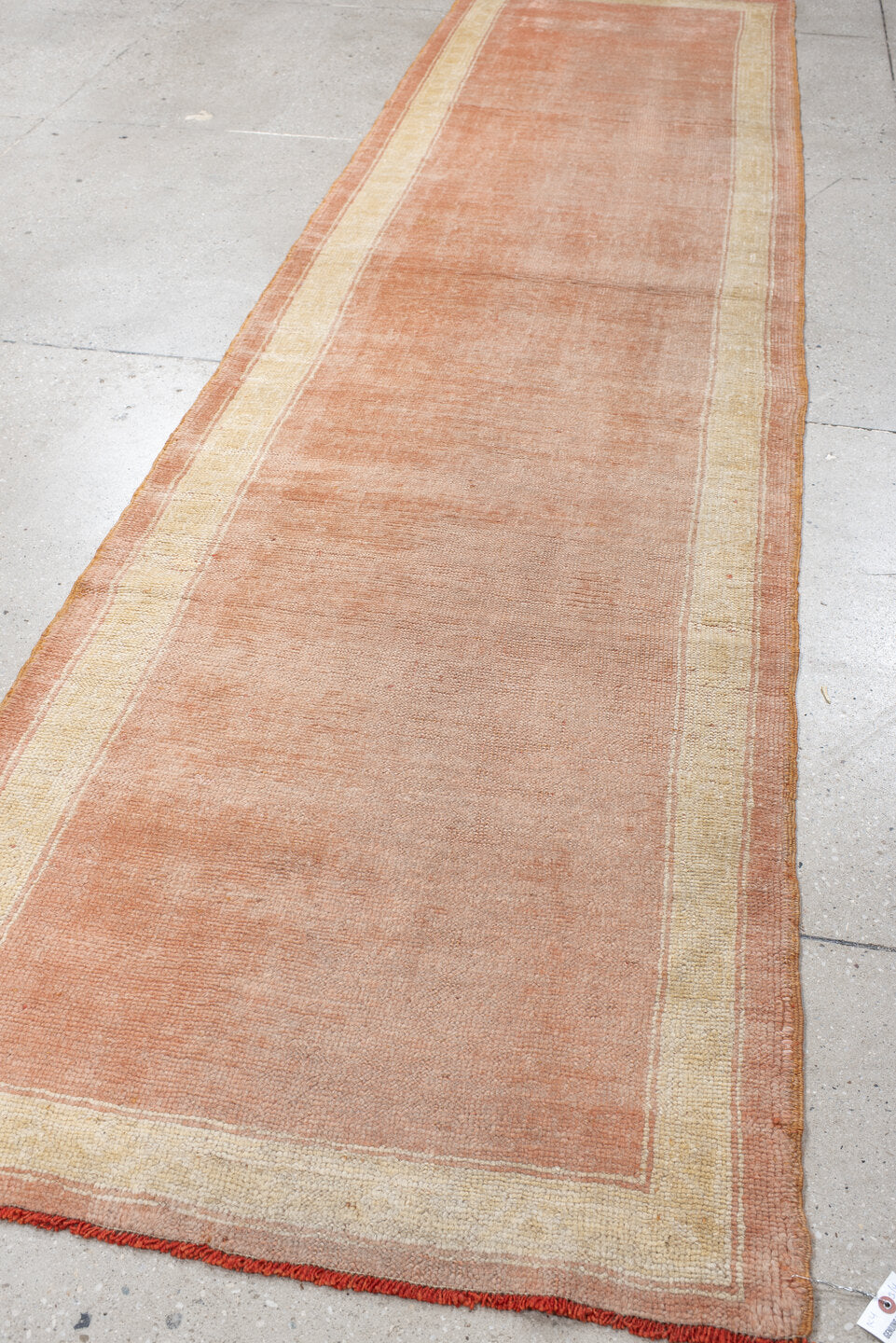 3' x 11' one-of-a-kind handmade vintage Oushak runner rug. Color palette: brown, off-white, orange, pink, wheat, yellow