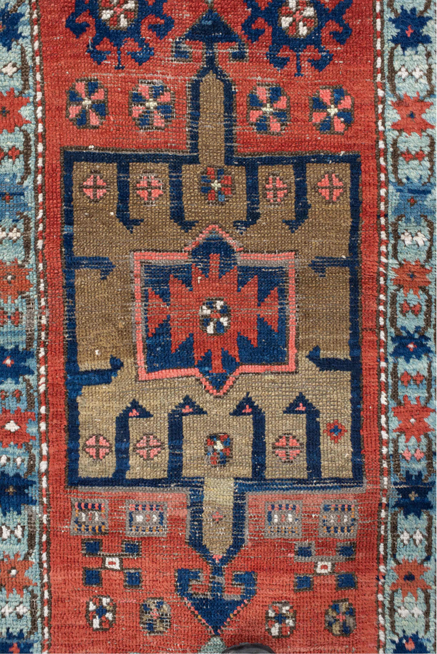 2' x 8' one-of-a-kind handmade vintage Heriz runner rug. Color palette: rust, navy, sky blue, ivory, camel, coral, charcoal