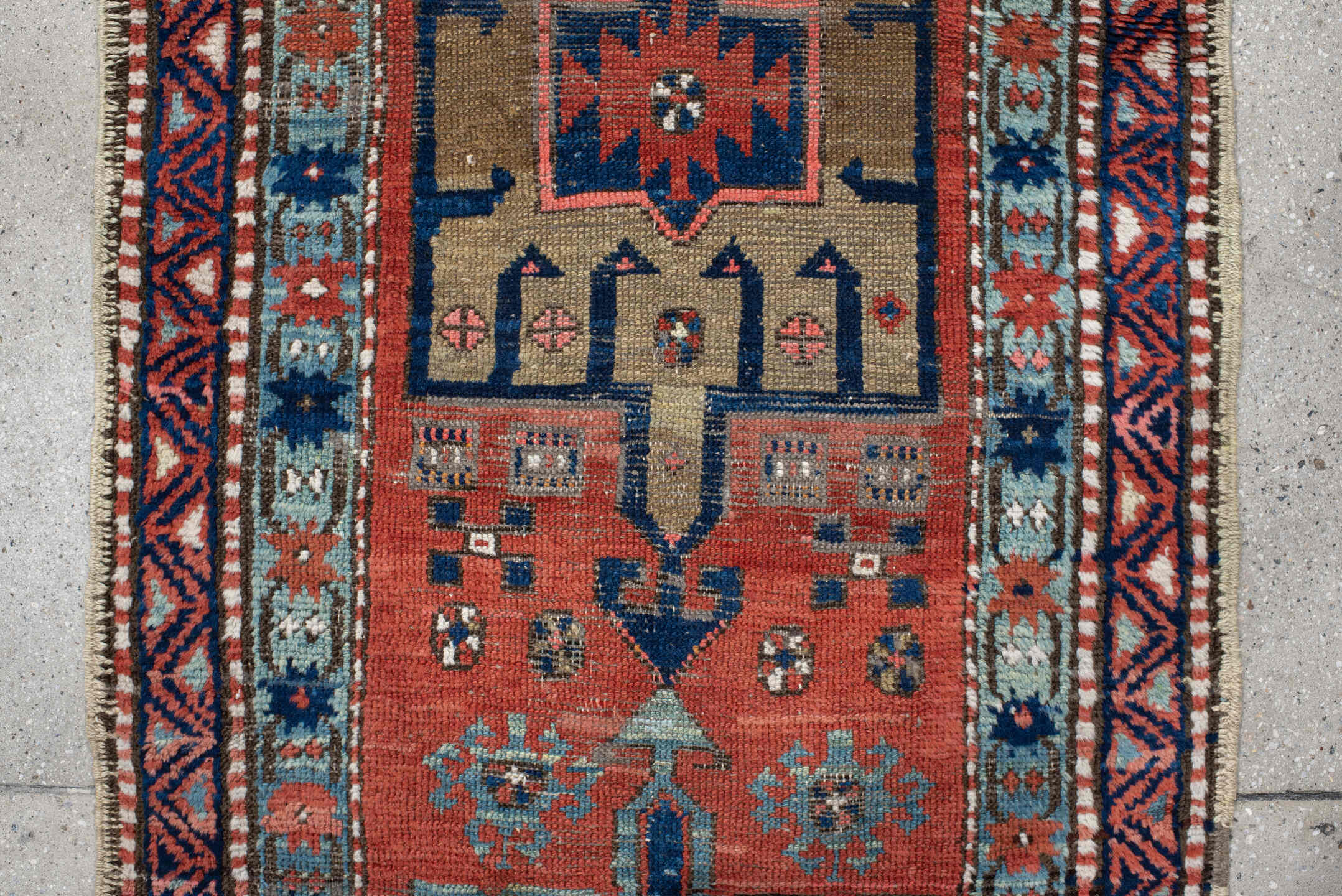 2' x 8' one-of-a-kind handmade vintage Heriz runner rug. Color palette: rust, navy, sky blue, ivory, camel, coral, charcoal