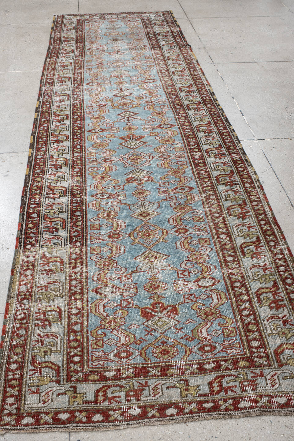 3' x 11' one-of-a-kind handmade vintage NW Persian runner rug. Color palette: sky blue, ivory, rust, brown, camel, taupe