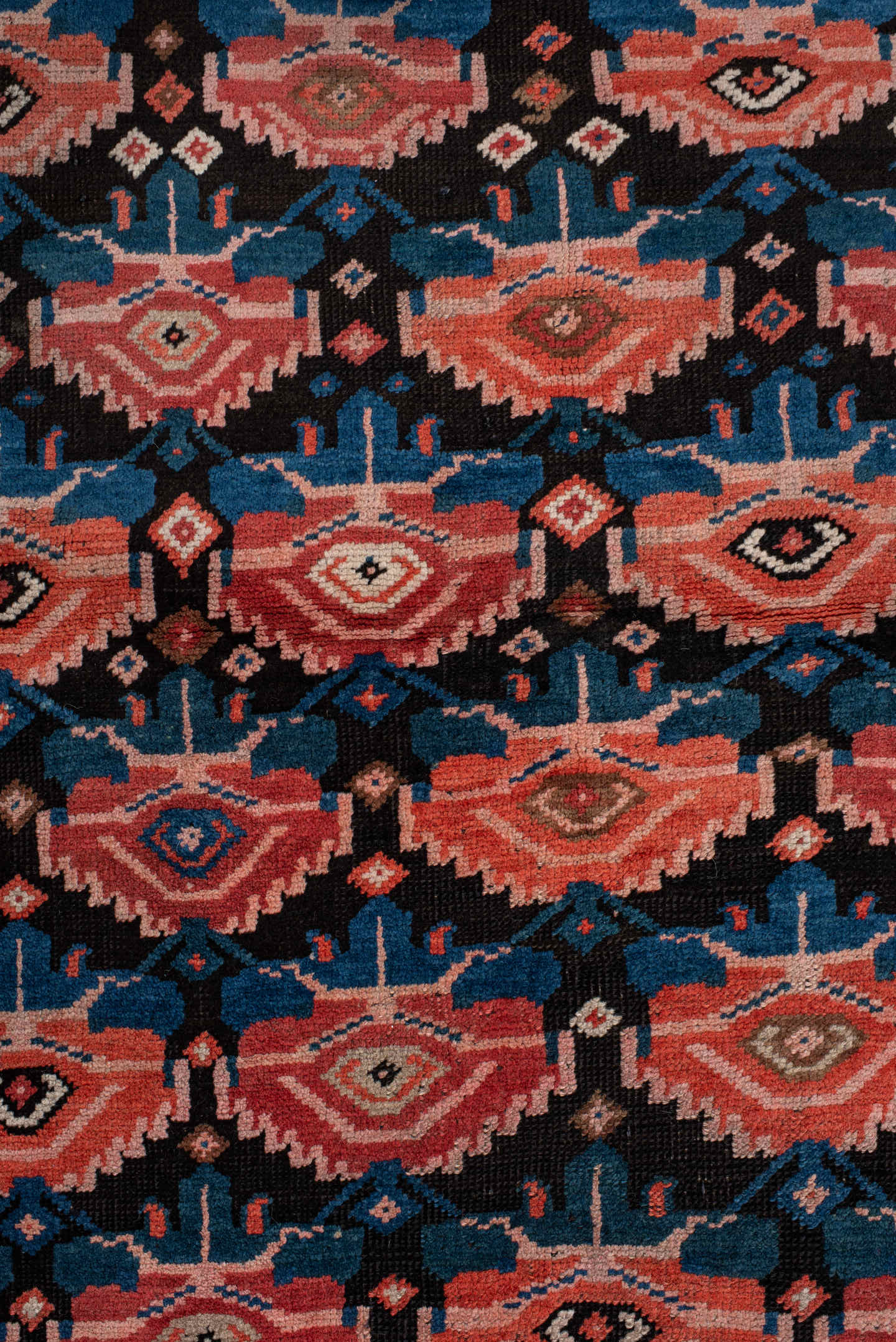4' x 6' one-of-a-kind handmade vintage Caucasian small size rug. Color palette: rust, charcoal, teal, coral, ivory, navy