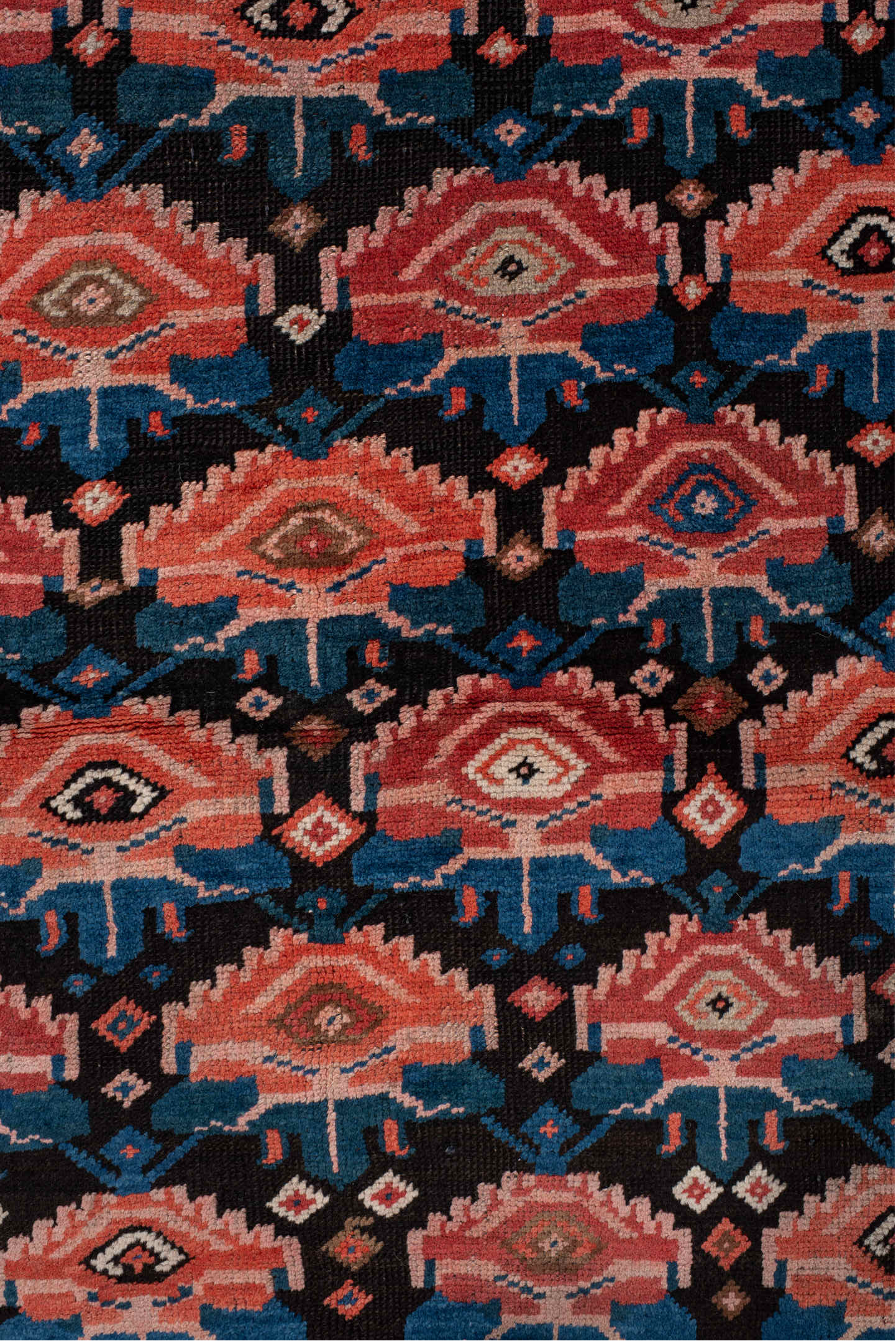 4' x 6' one-of-a-kind handmade vintage Caucasian small size rug. Color palette: blue, brown, dark gray, dark salmon