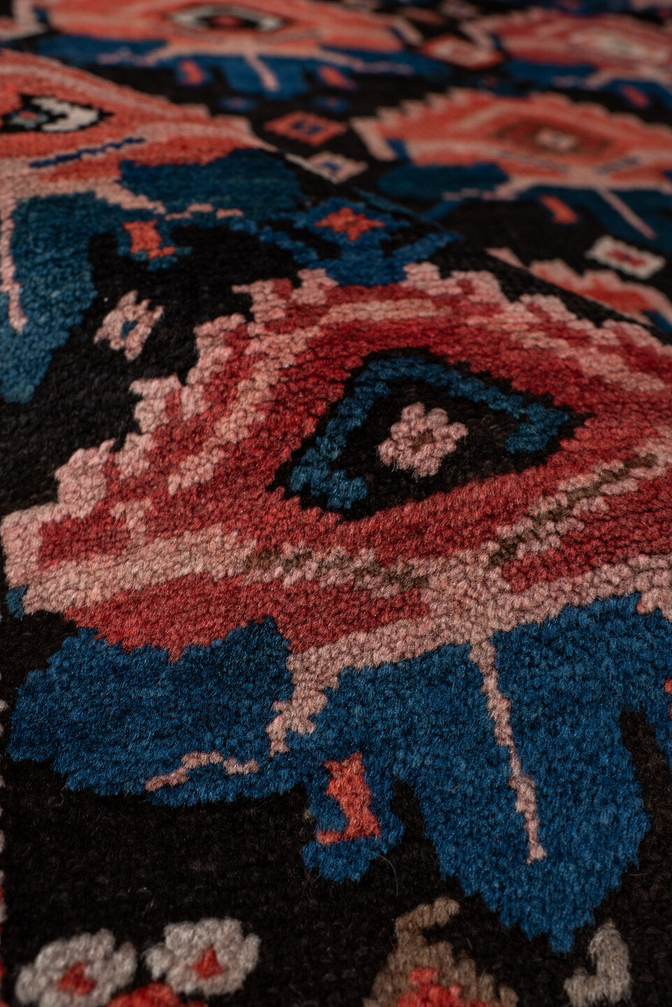4' x 6' one-of-a-kind handmade vintage Caucasian small size rug. Color palette: rust, charcoal, teal, coral, ivory, navy
