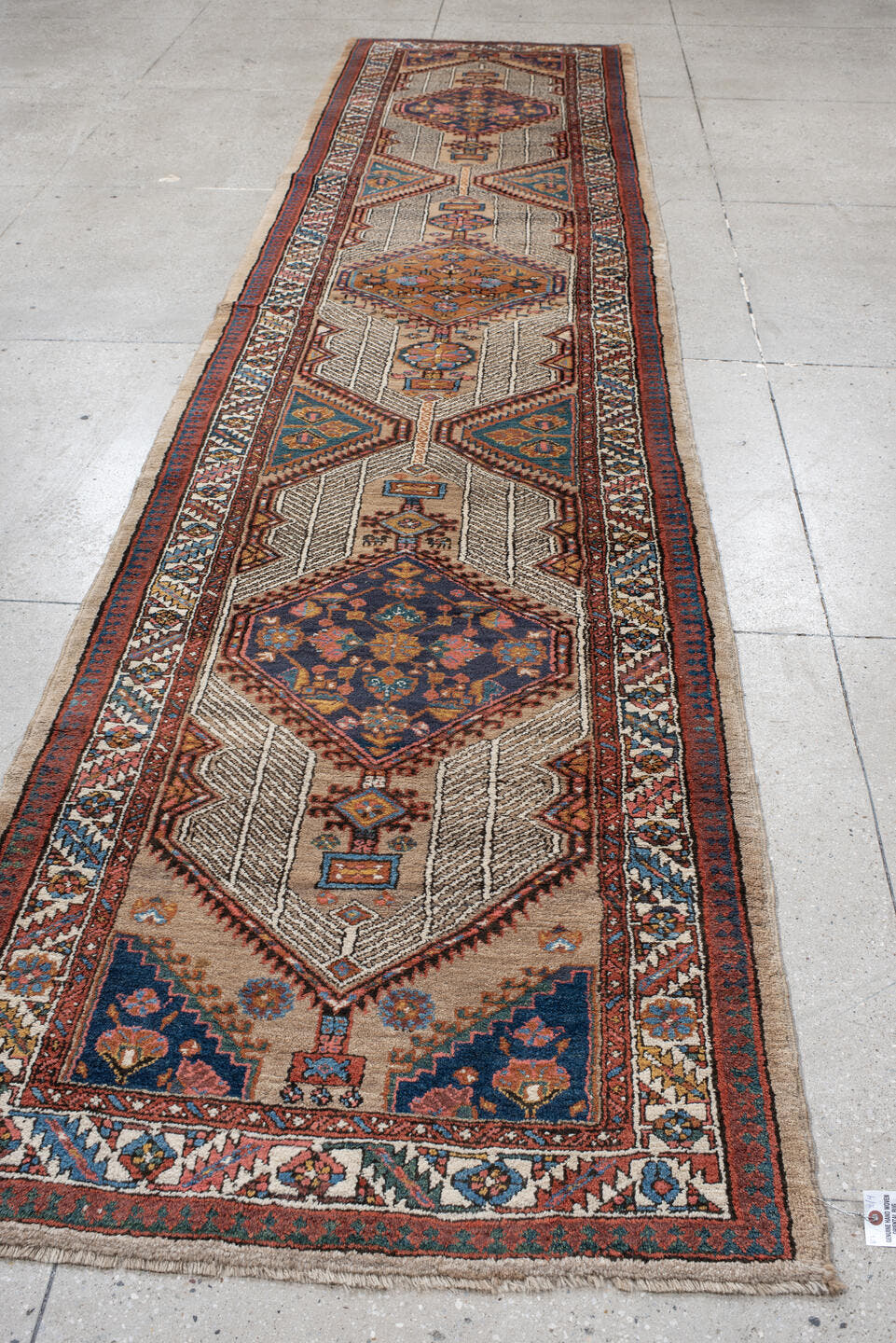 3' x 15' one-of-a-kind handmade vintage Sarab runner rug. Color palette: ivory, rust, indigo, camel, navy, terra cotta