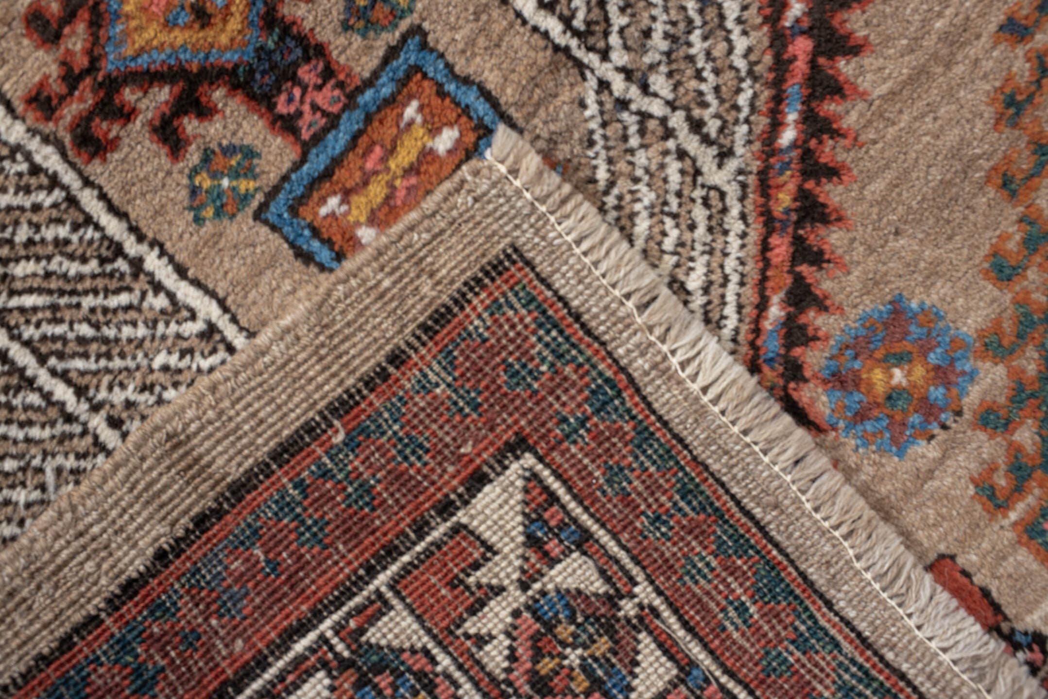 3' x 15' one-of-a-kind handmade vintage Sarab runner rug. Color palette: ivory, rust, indigo, camel, navy, terra cotta