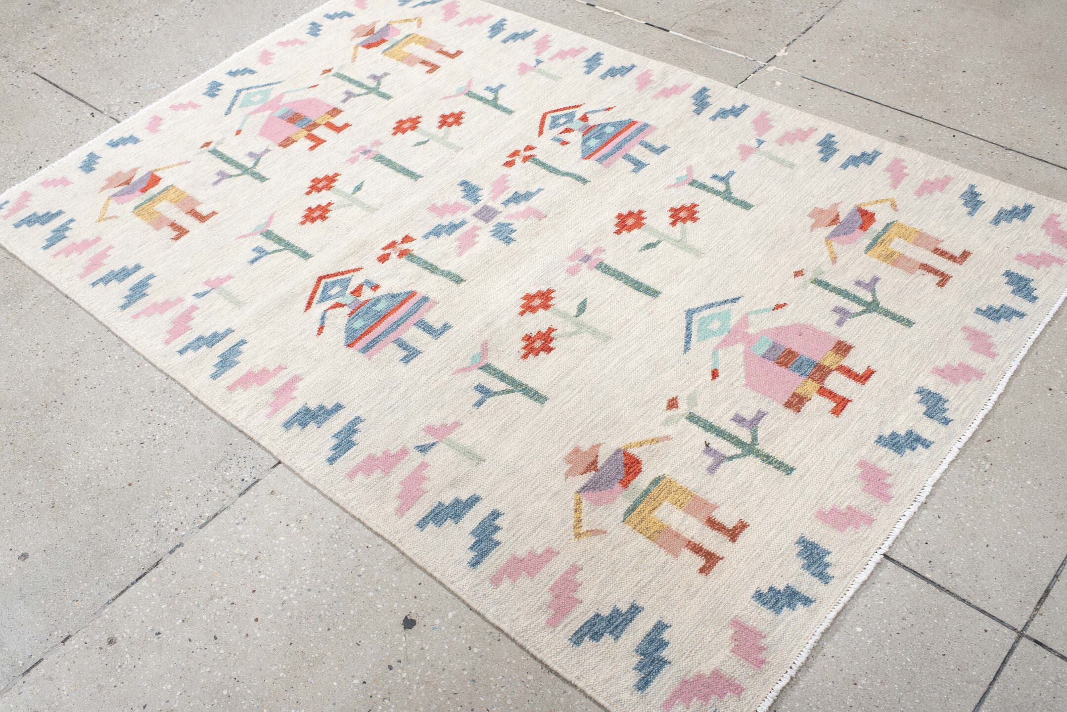 4' x 5' one-of-a-kind handmade vintage Scadinavian small size rug. Color palette: ivory, pink, sky_blue, seafoam, rust
