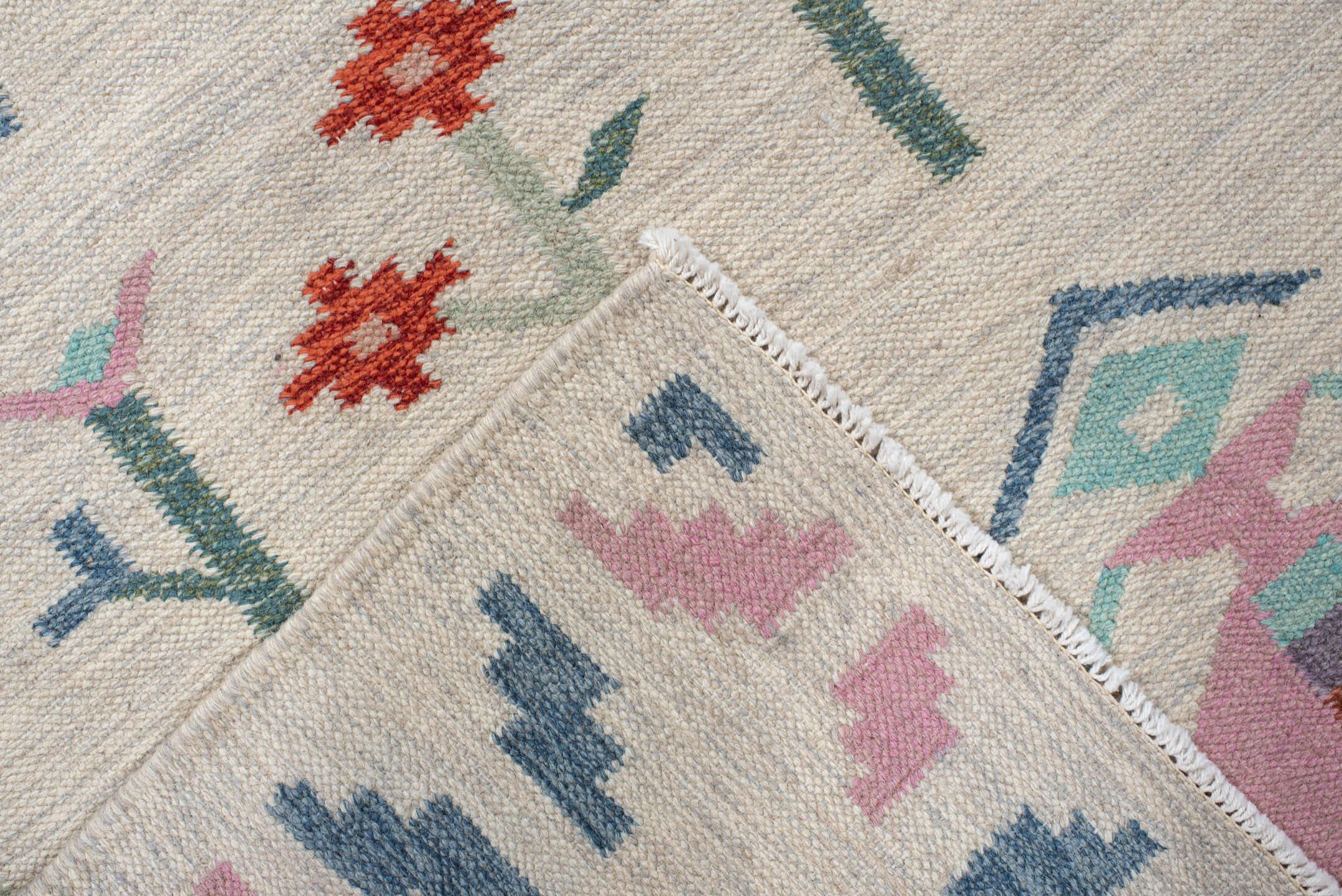 4' x 5' one-of-a-kind handmade vintage Scadinavian small size rug. Color palette: ivory, pink, sky_blue, seafoam, rust