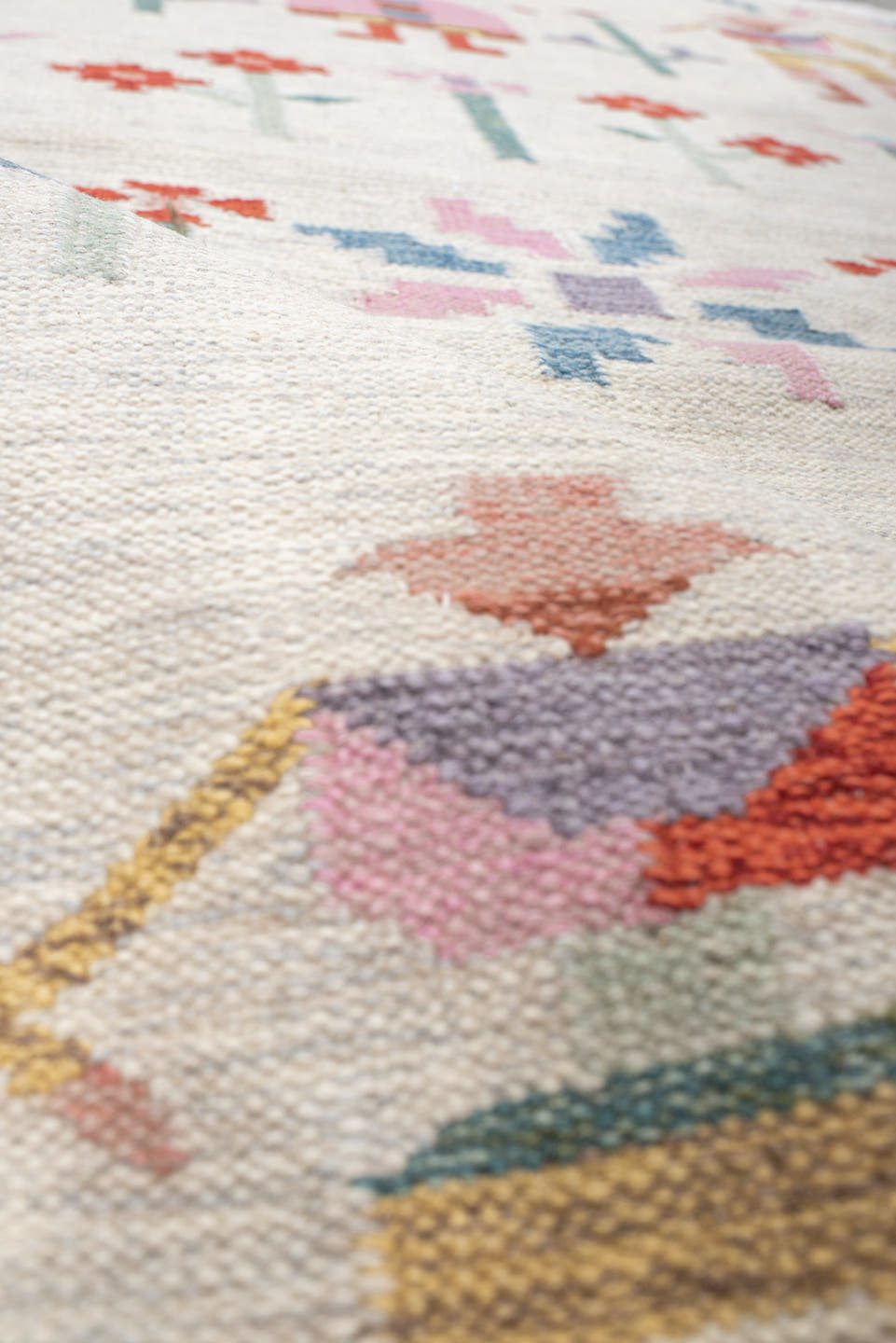 4' x 5' one-of-a-kind handmade vintage Scadinavian small size rug. Color palette: ivory, pink, sky_blue, seafoam, rust