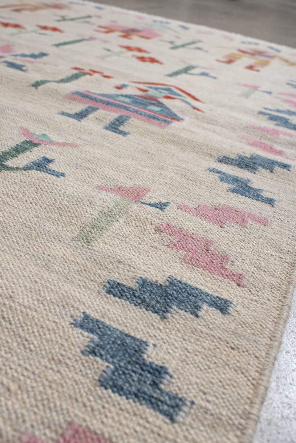 4' x 5' one-of-a-kind handmade vintage Scadinavian small size rug. Color palette: ivory, pink, sky_blue, seafoam, rust