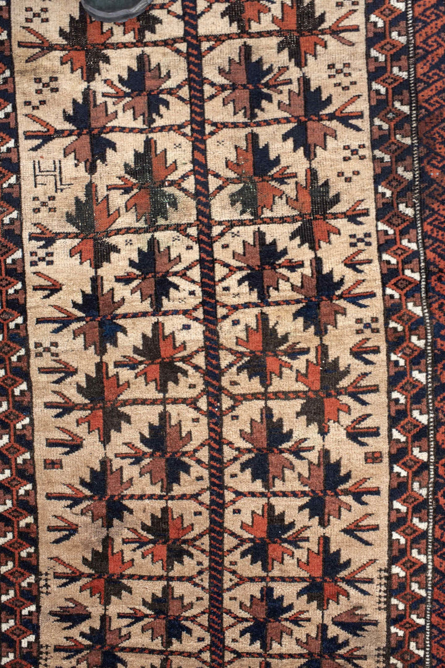 2' x 4' one-of-a-kind handmade vintage Belouch small size rug. Color palette: ivory, rust, navy, camel, brown, terracotta
