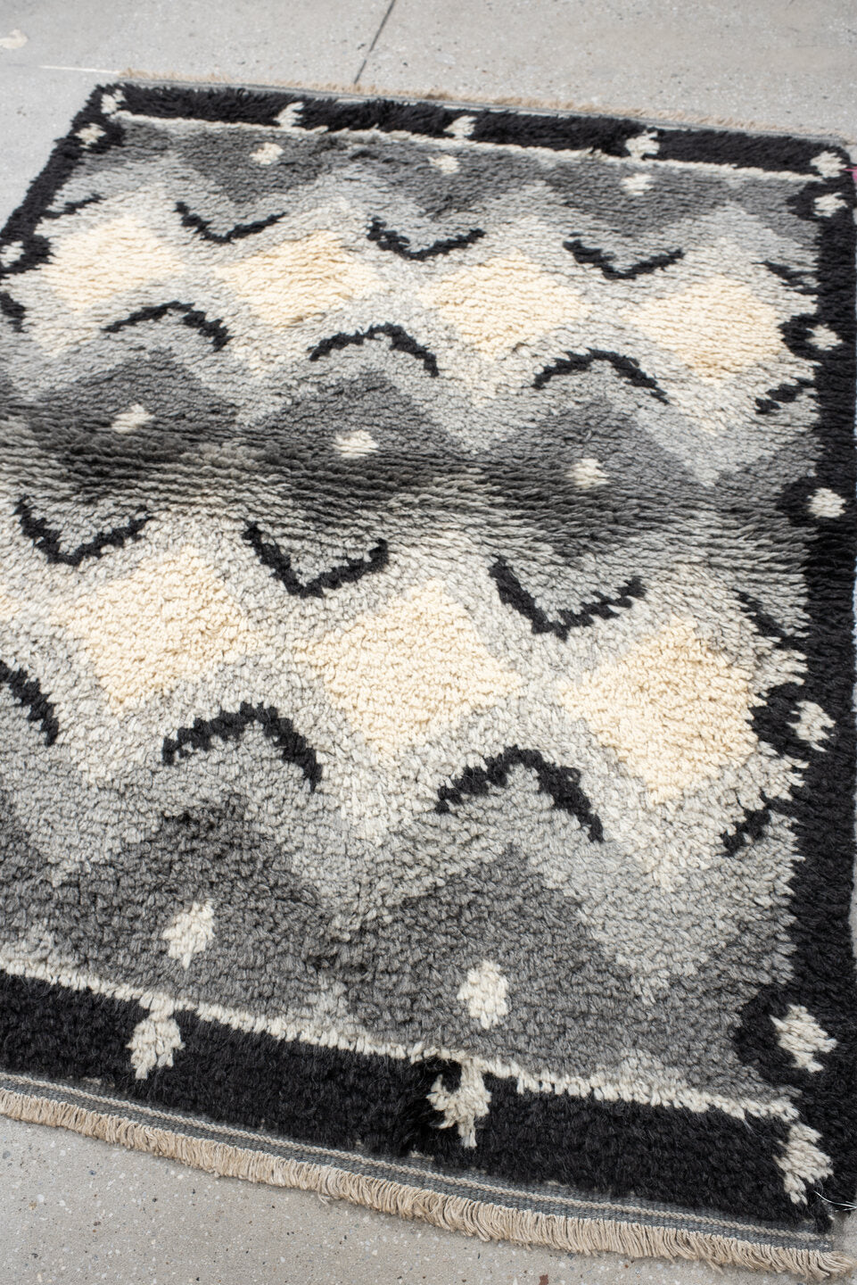 3' x 5' one-of-a-kind handmade vintage Scadinavian small size rug. Color palette: gray, ivory, charcoal, black, cream