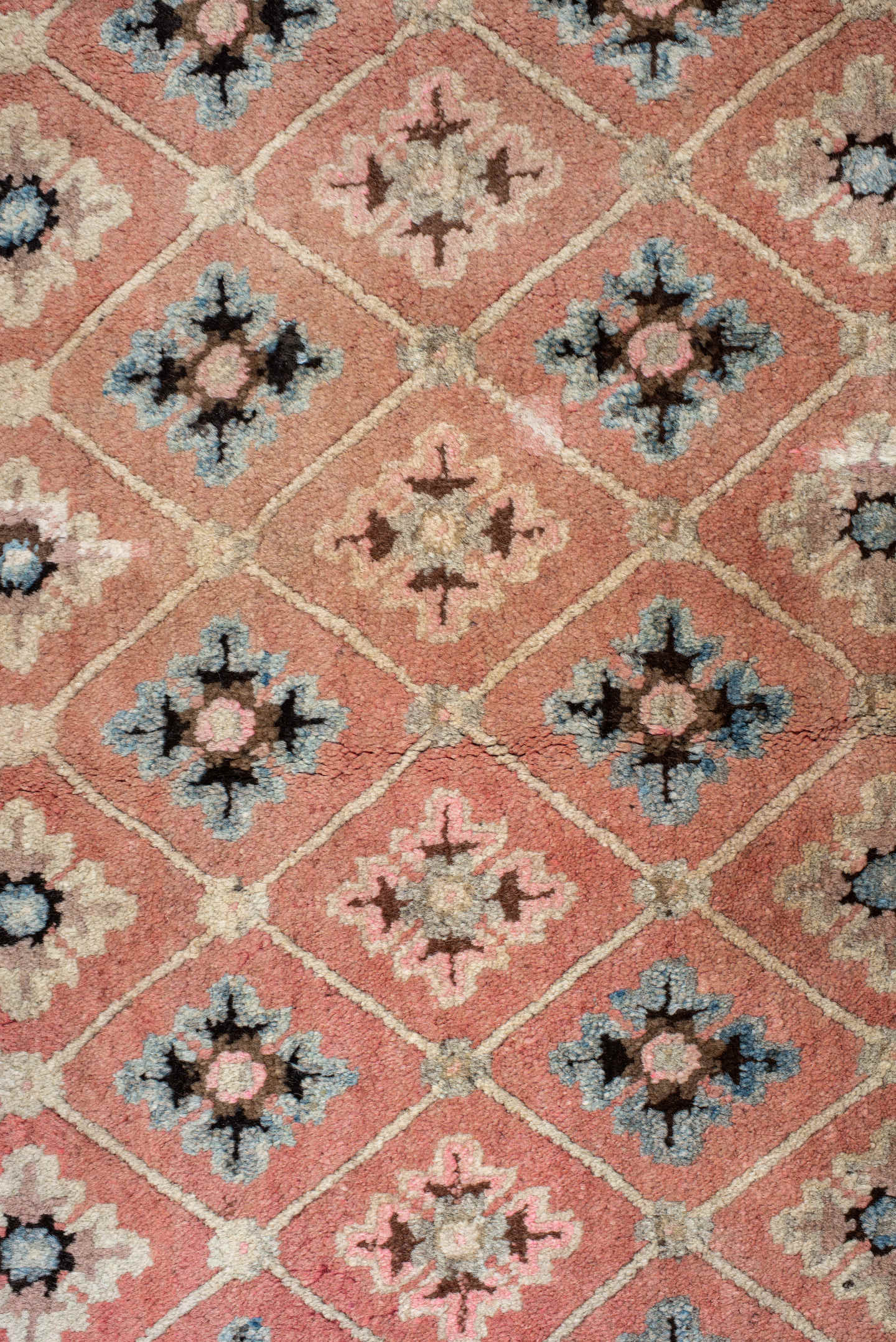 4' x 7' one-of-a-kind handmade vintage Tibetan rug. Color palette: salmon, charcoal, sky blue, ivory, rose, taupe, brown