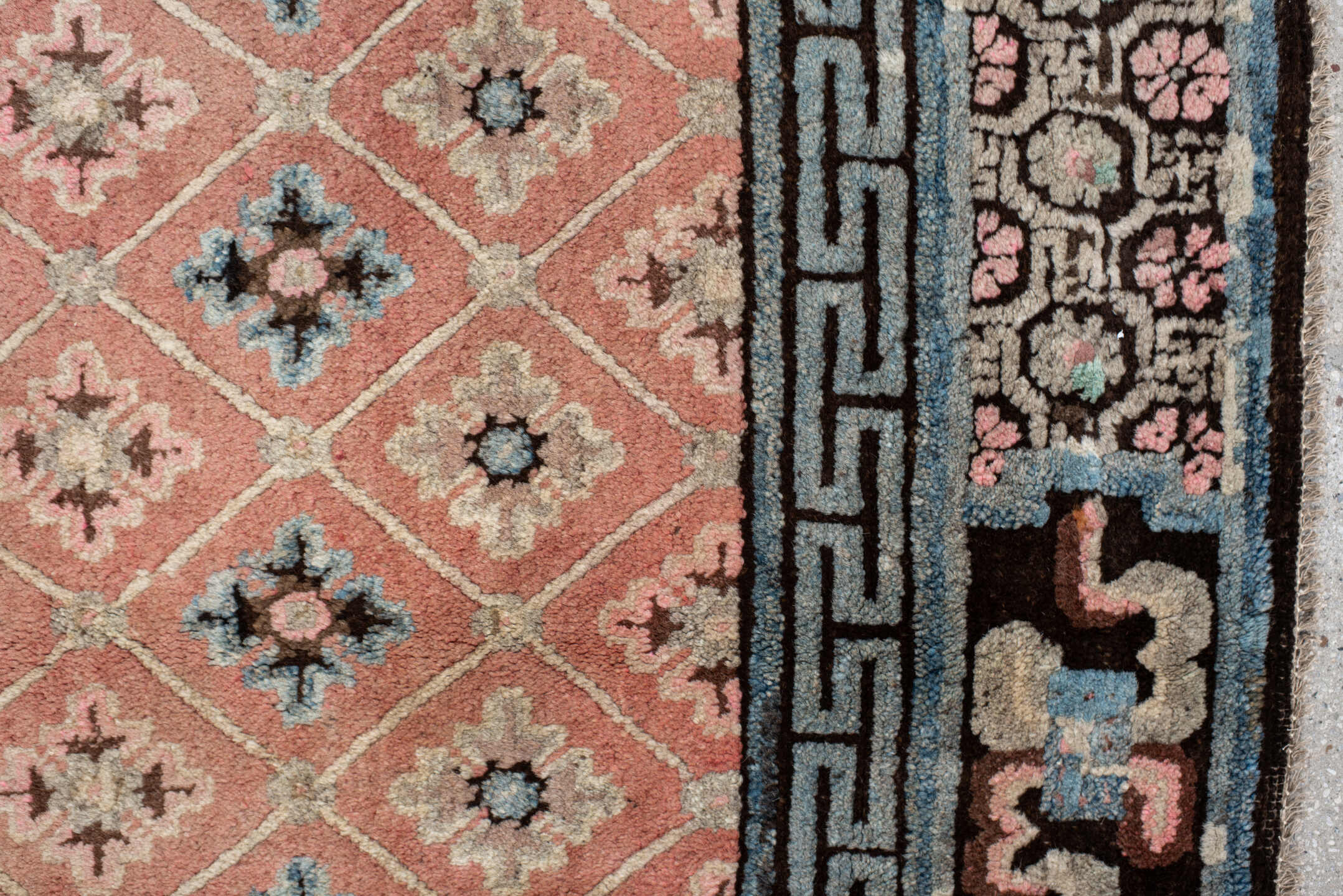 4' x 7' one-of-a-kind handmade vintage Tibetan rug. Color palette: salmon, charcoal, sky blue, ivory, rose, taupe, brown