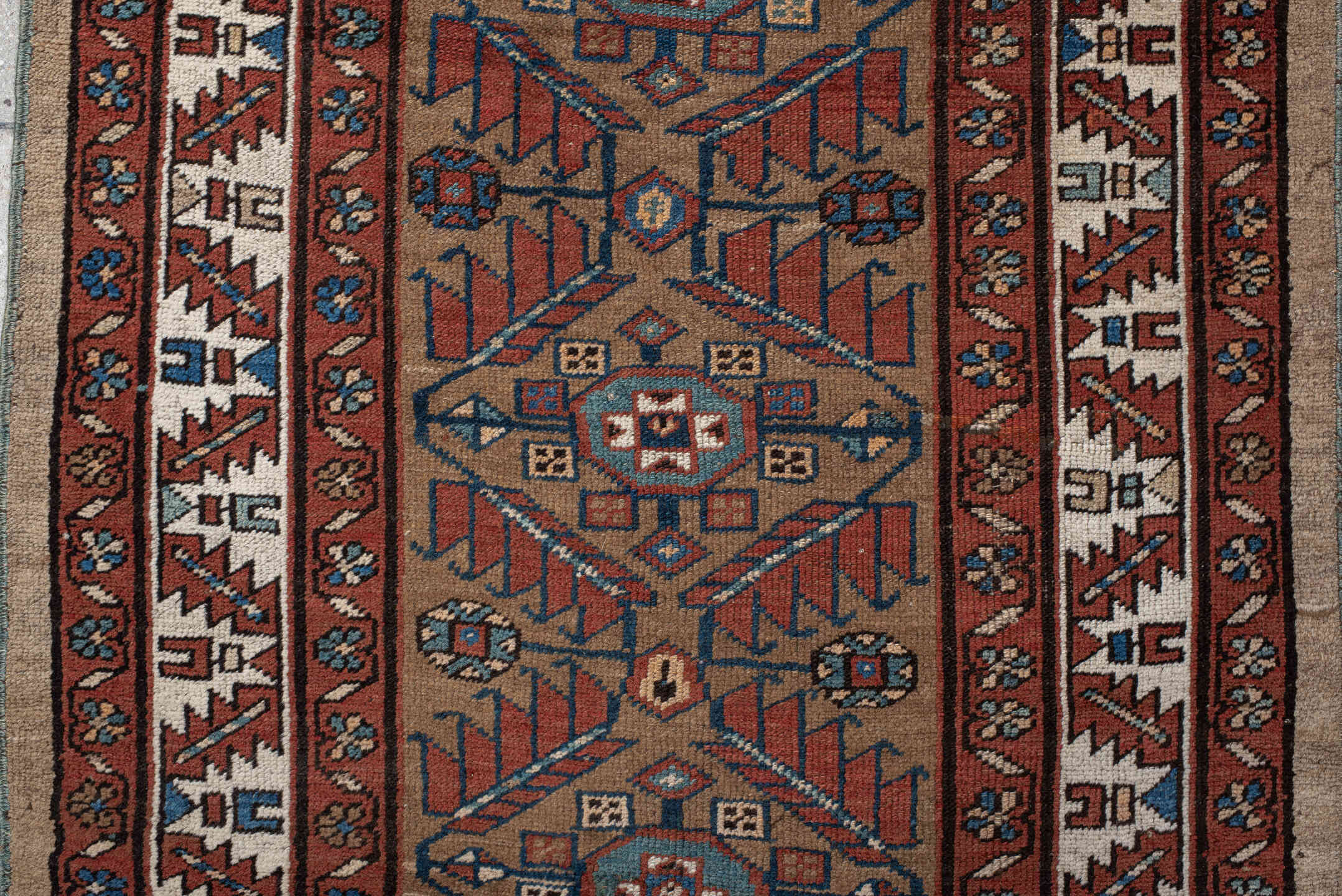 3' x 10' one-of-a-kind handmade vintage NW Persian runner rug. Color palette: camel, rust, ivory, indigo, terra cotta, brown