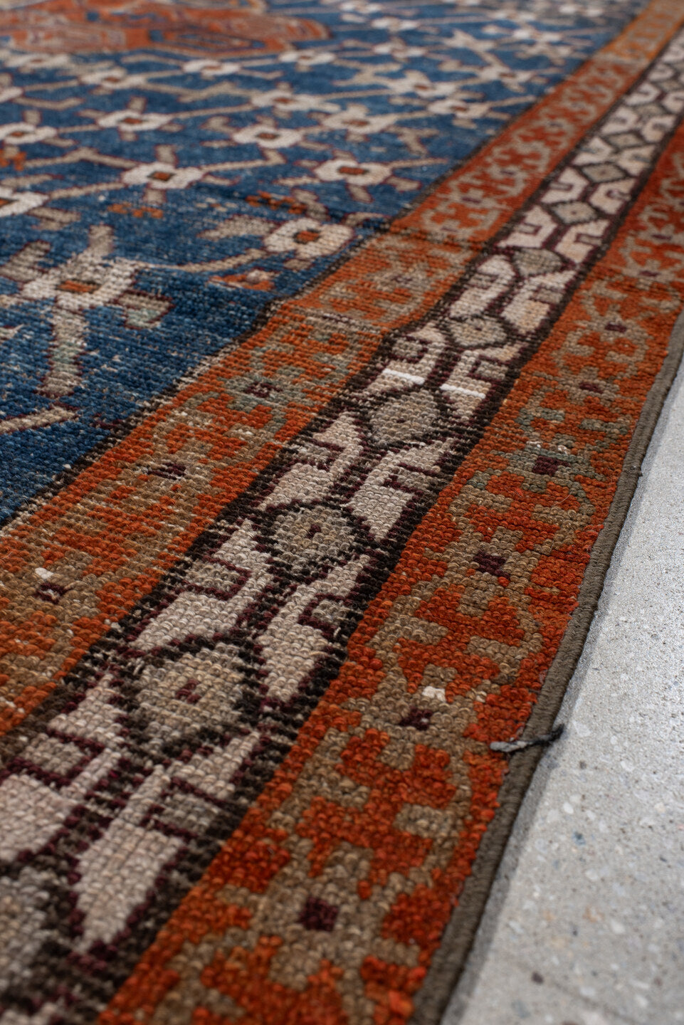 6' x 11' one-of-a-kind handmade vintage Caucasian large size rug. Color palette: blue, rust, ivory, brown, taupe, charcoal