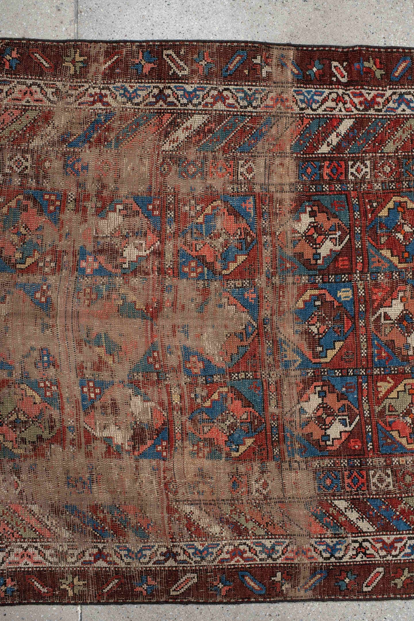 3' x 11' one-of-a-kind handmade antique Varamin runner rug. Color palette: brown, camel, indigo, rust, ivory, terra cotta
