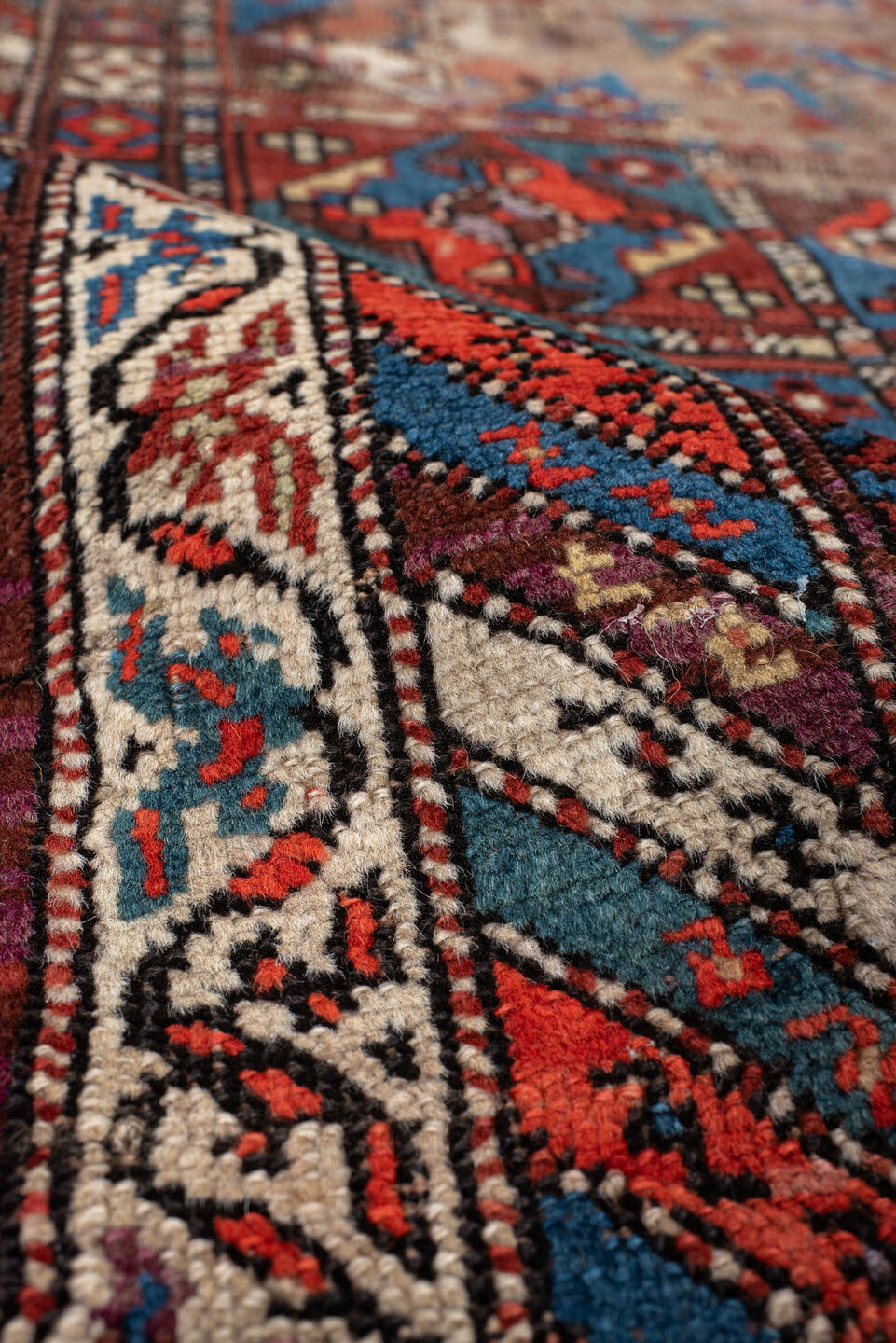 3' x 11' one-of-a-kind handmade antique Varamin runner rug. Color palette: brown, camel, indigo, rust, ivory, terra cotta